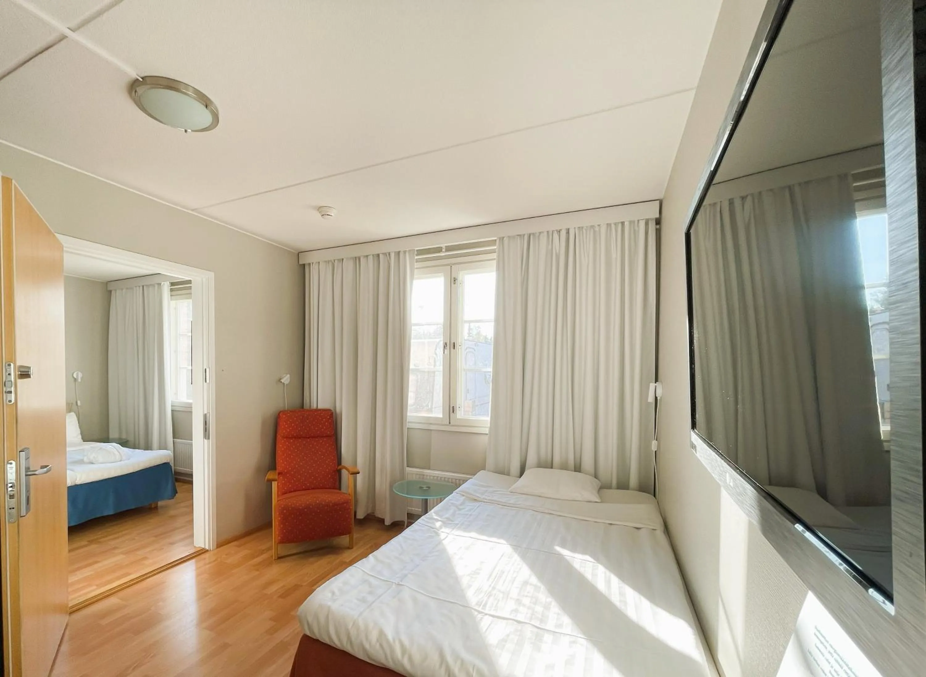 TV and multimedia, Bed in Hotel Jokipuisto