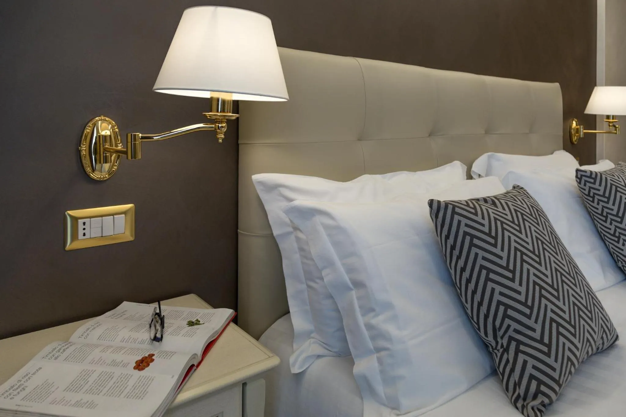 Bed in Vittorio Emanuele Boutique Hotel