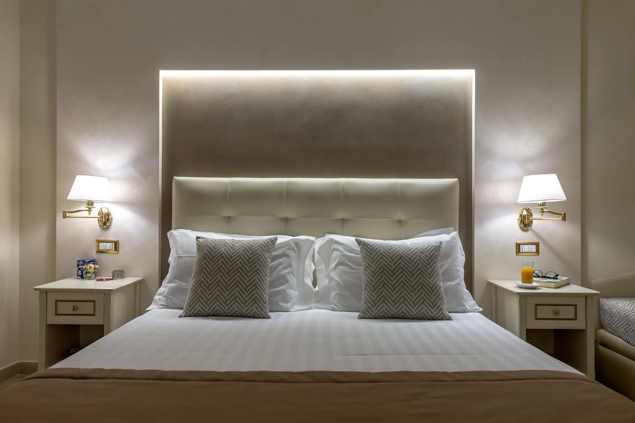 Bed in Vittorio Emanuele Boutique Hotel