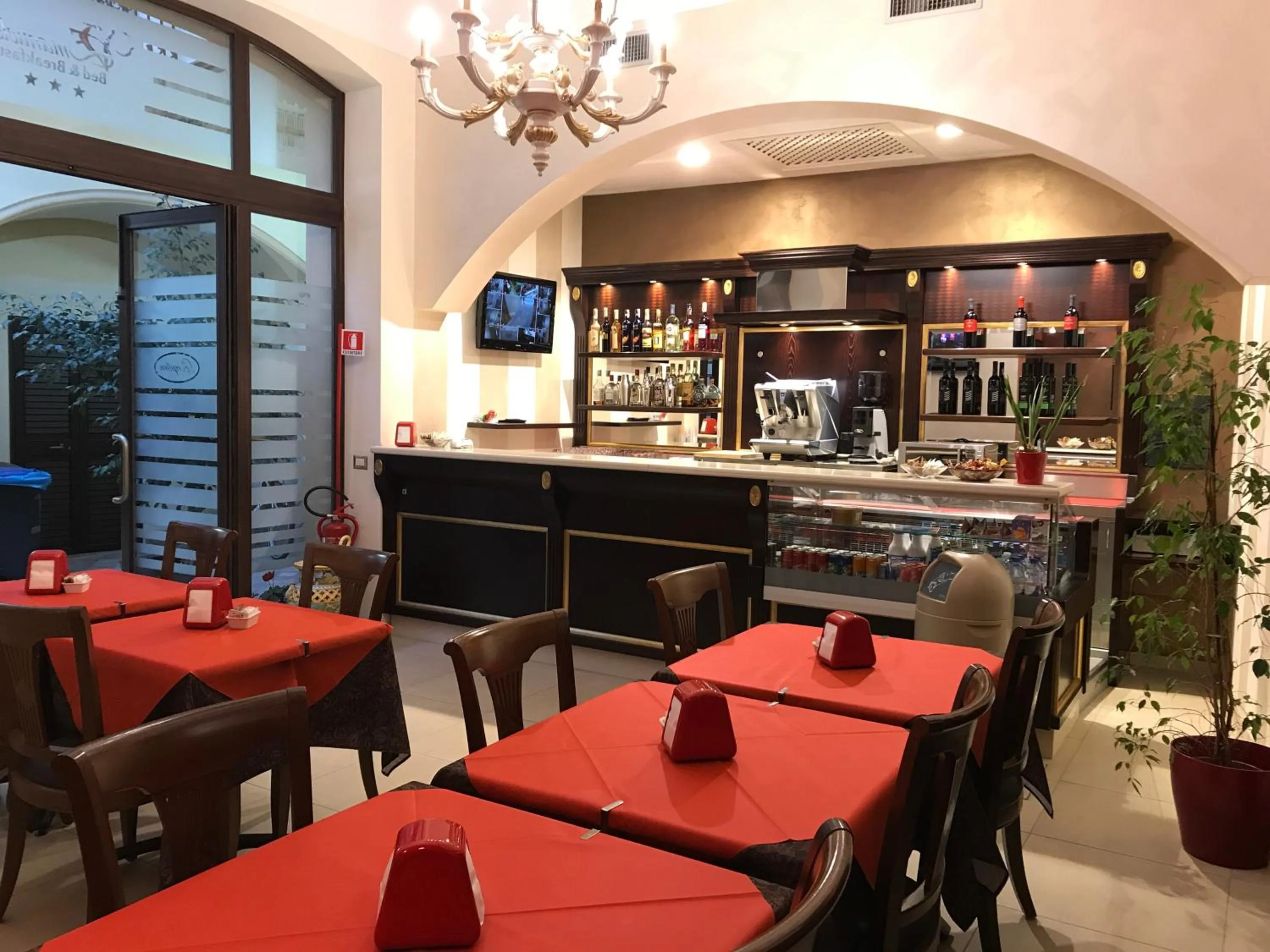 Lounge or bar in Vittorio Emanuele Boutique Hotel