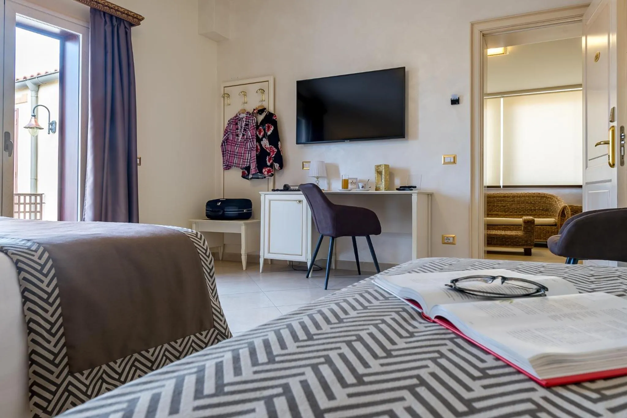 Photo of the whole room, Bed in Vittorio Emanuele Boutique Hotel