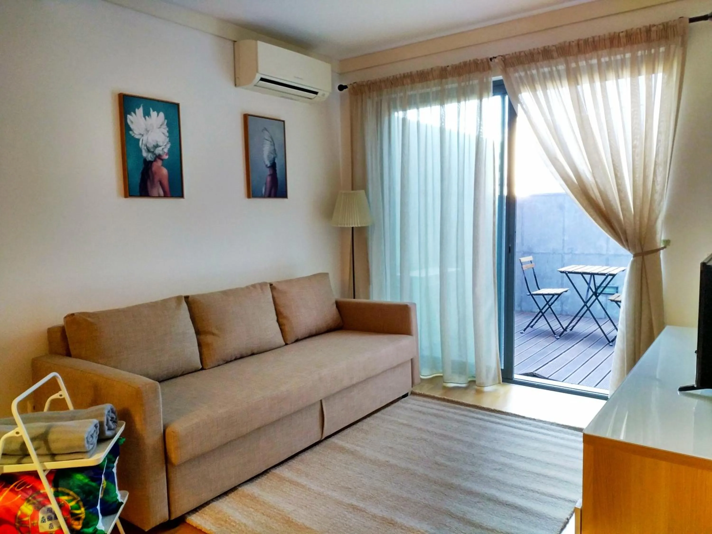 Living room in Nice duplex apartment with free pool and garage