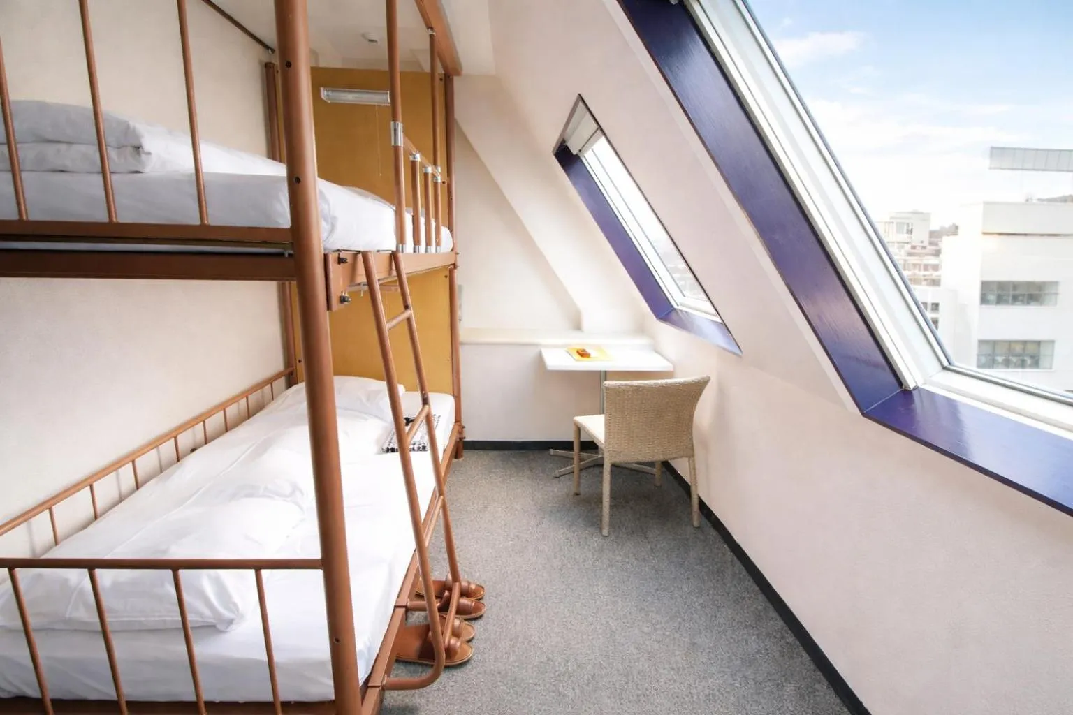 Bed in Sakura Hotel Jimbocho