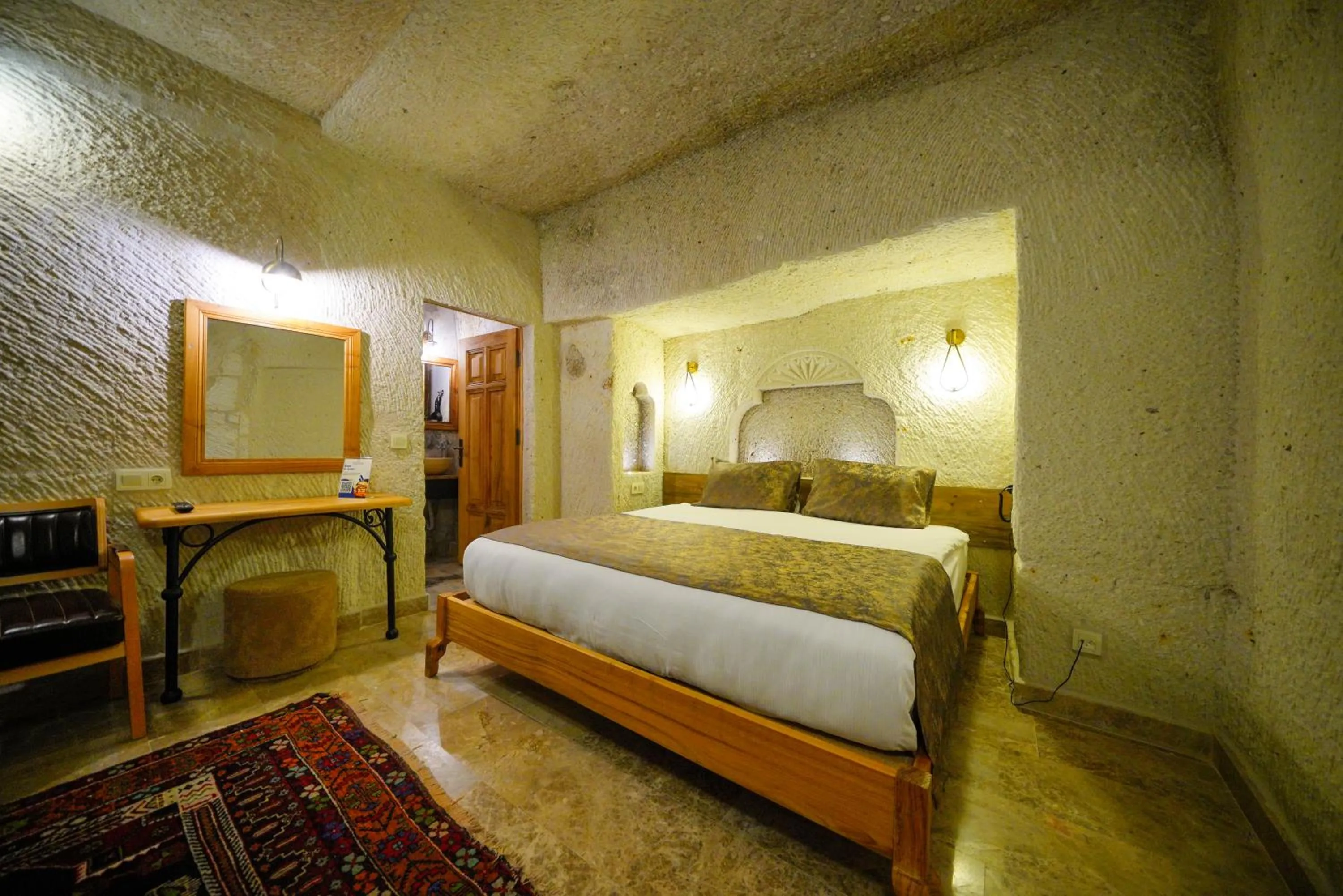 Bed in Cave Hotel Saksagan