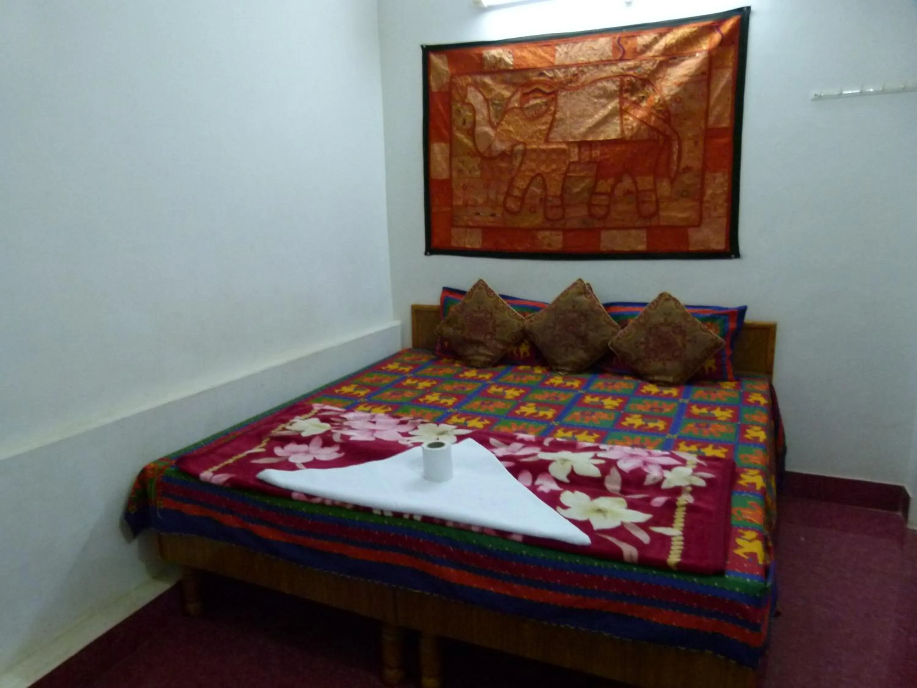 Bed in Gajanand Guest House