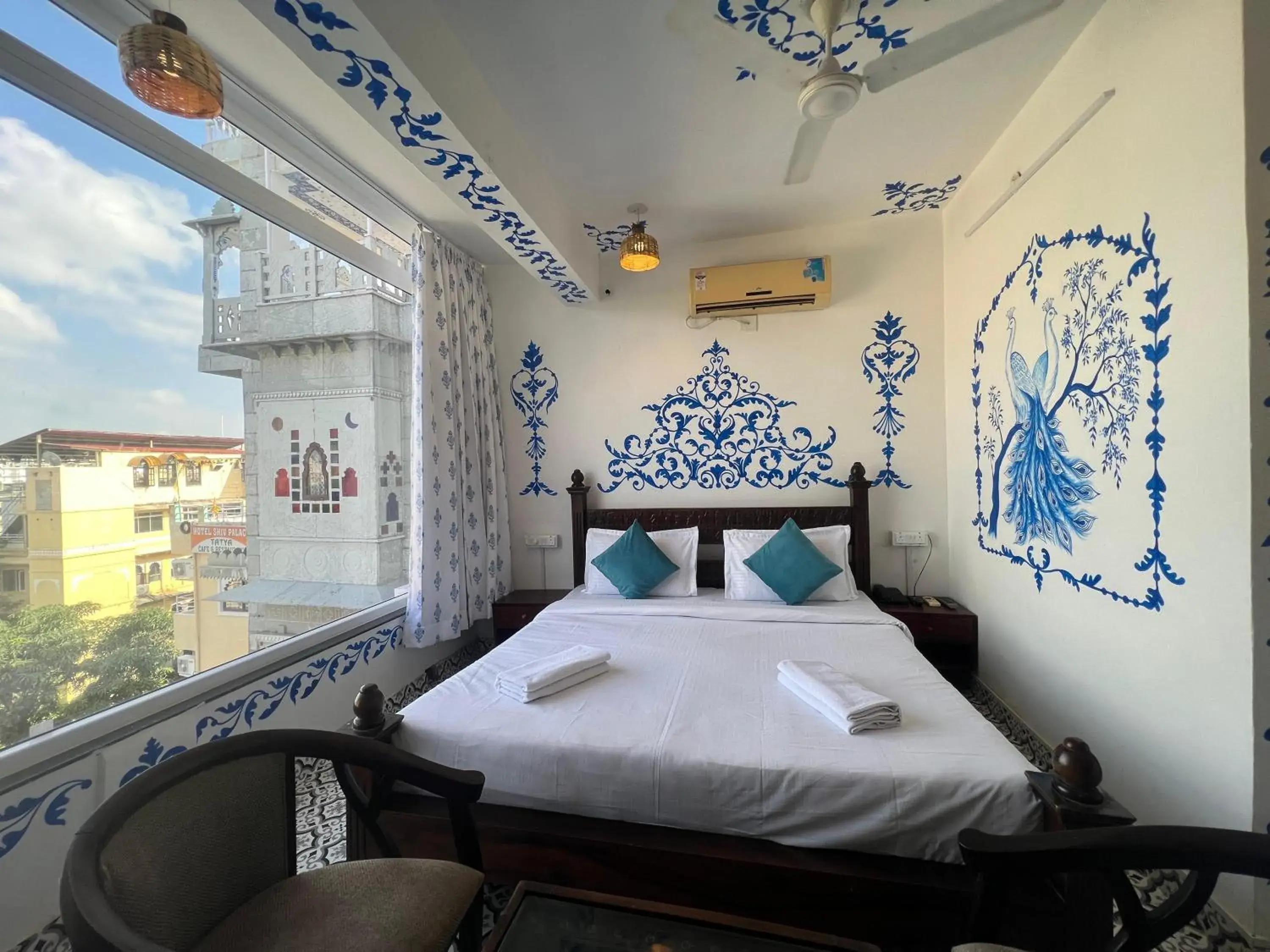 Super Deluxe Room with Balcony and Lake View in Storica Stays Panorama Haveli Udaipur Super Deluxe Room with Balcony and Lake View in Storica Stays Panorama Haveli Udaipur