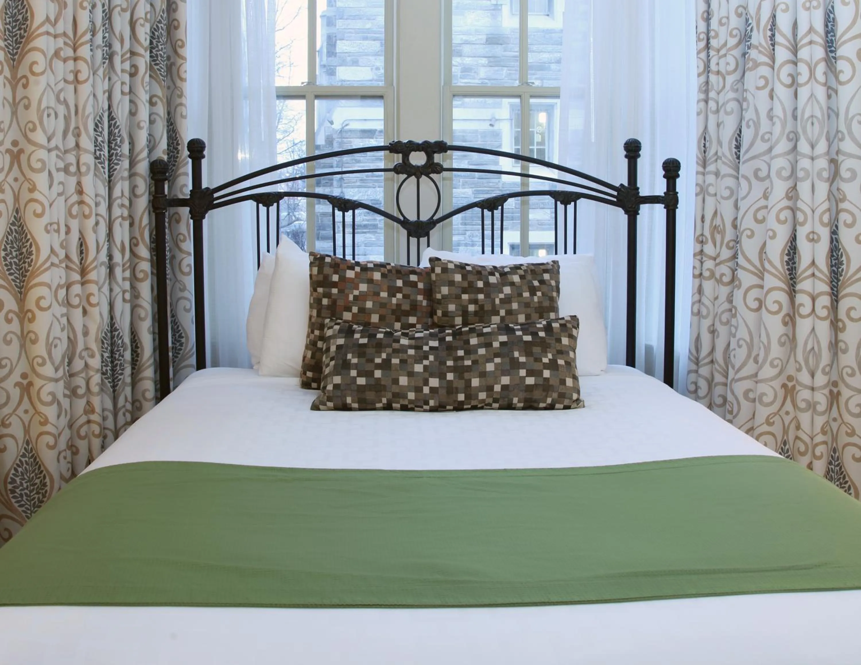 Bed in The Conwell Inn