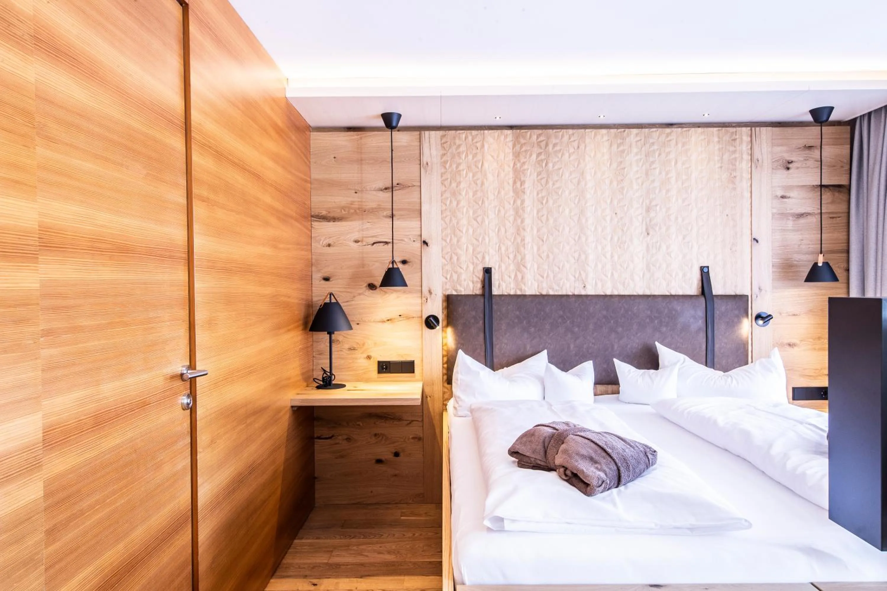 Bed in Alpen Hotel Post