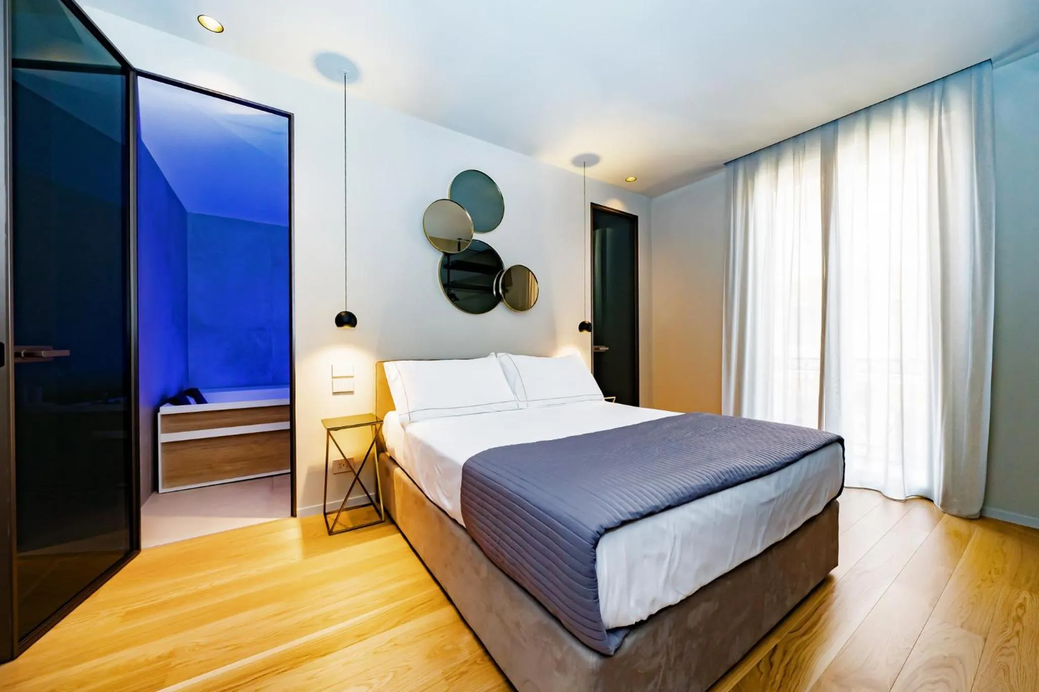 Bed in Elite Accommodations & Hydromassage Pool