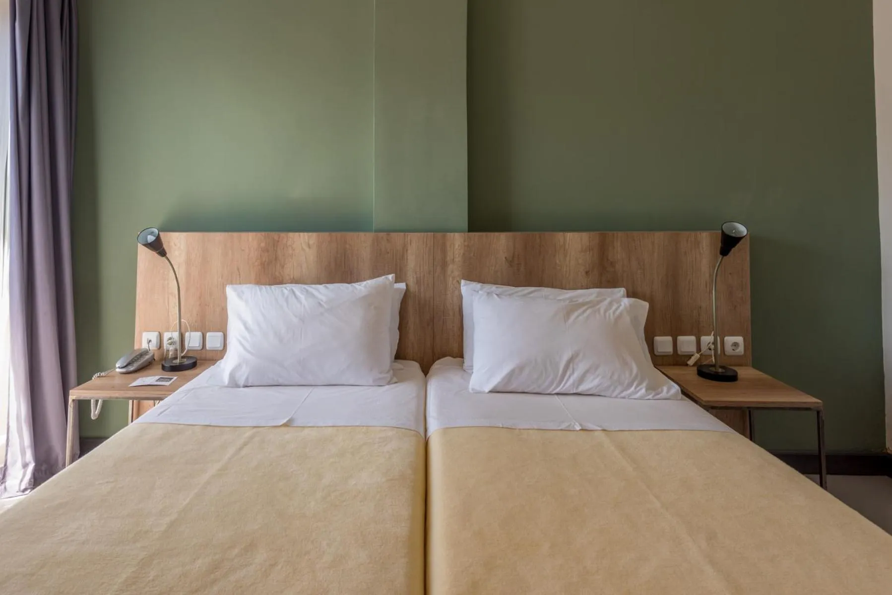 Bed in Alexios Hotel