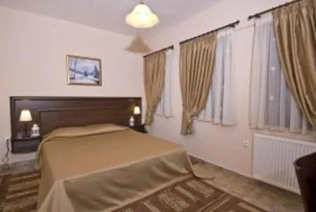 Bed in Hotel Kapsalis