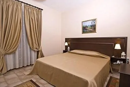 Bed in Hotel Kapsalis