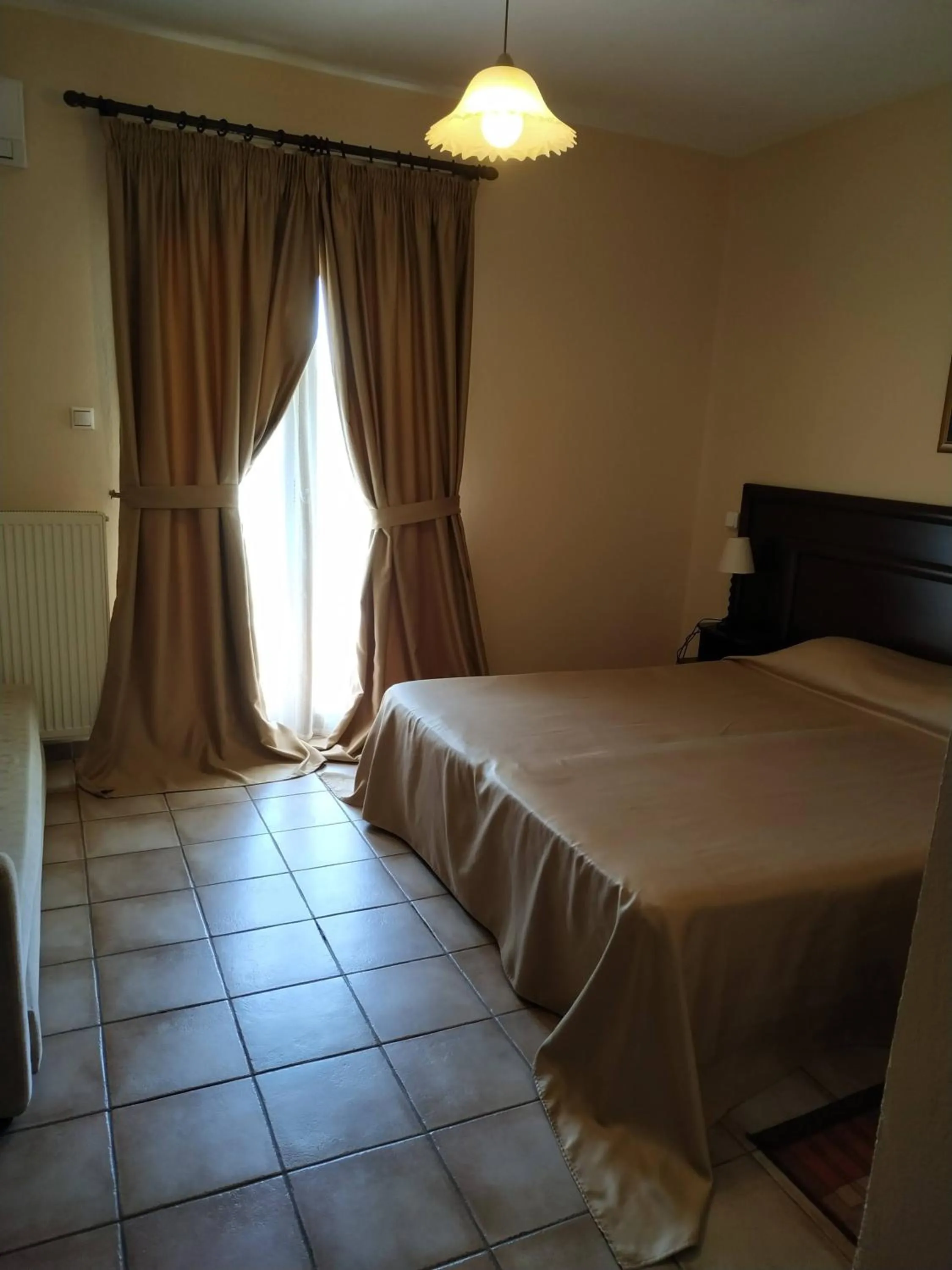 Bed in Hotel Kapsalis