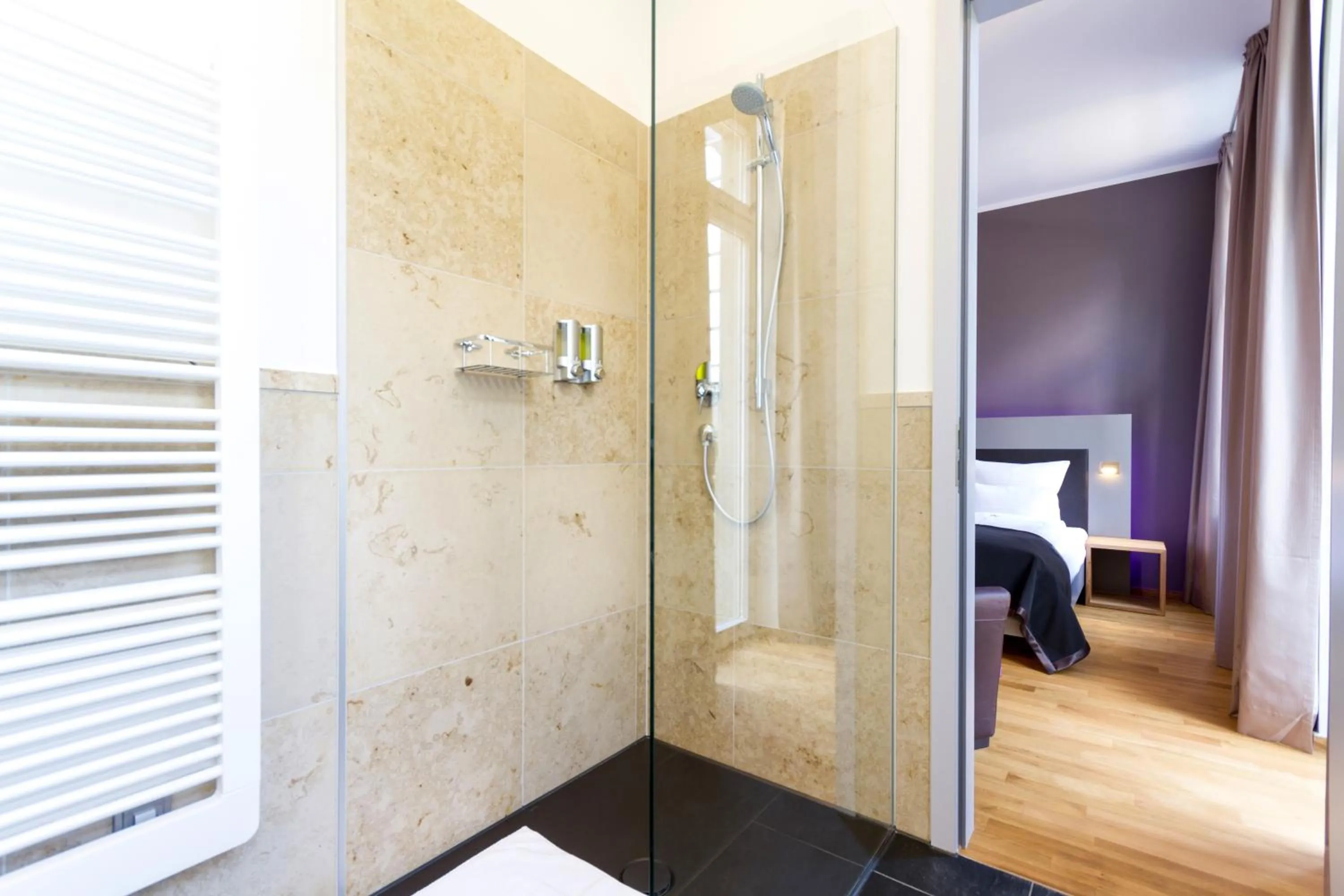 Bathroom, Bed in Qube Hotel Bergheim