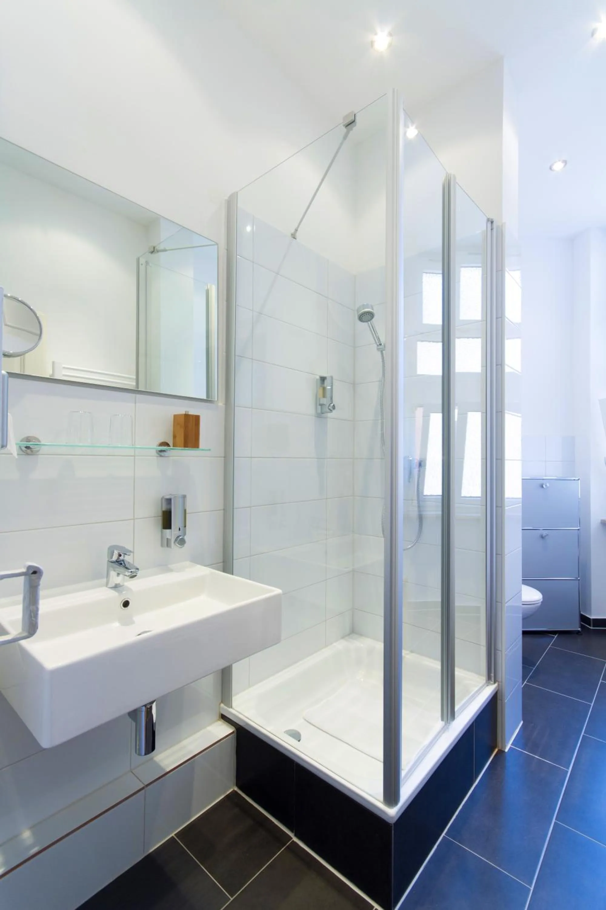 Bathroom in Qube Hotel Bergheim