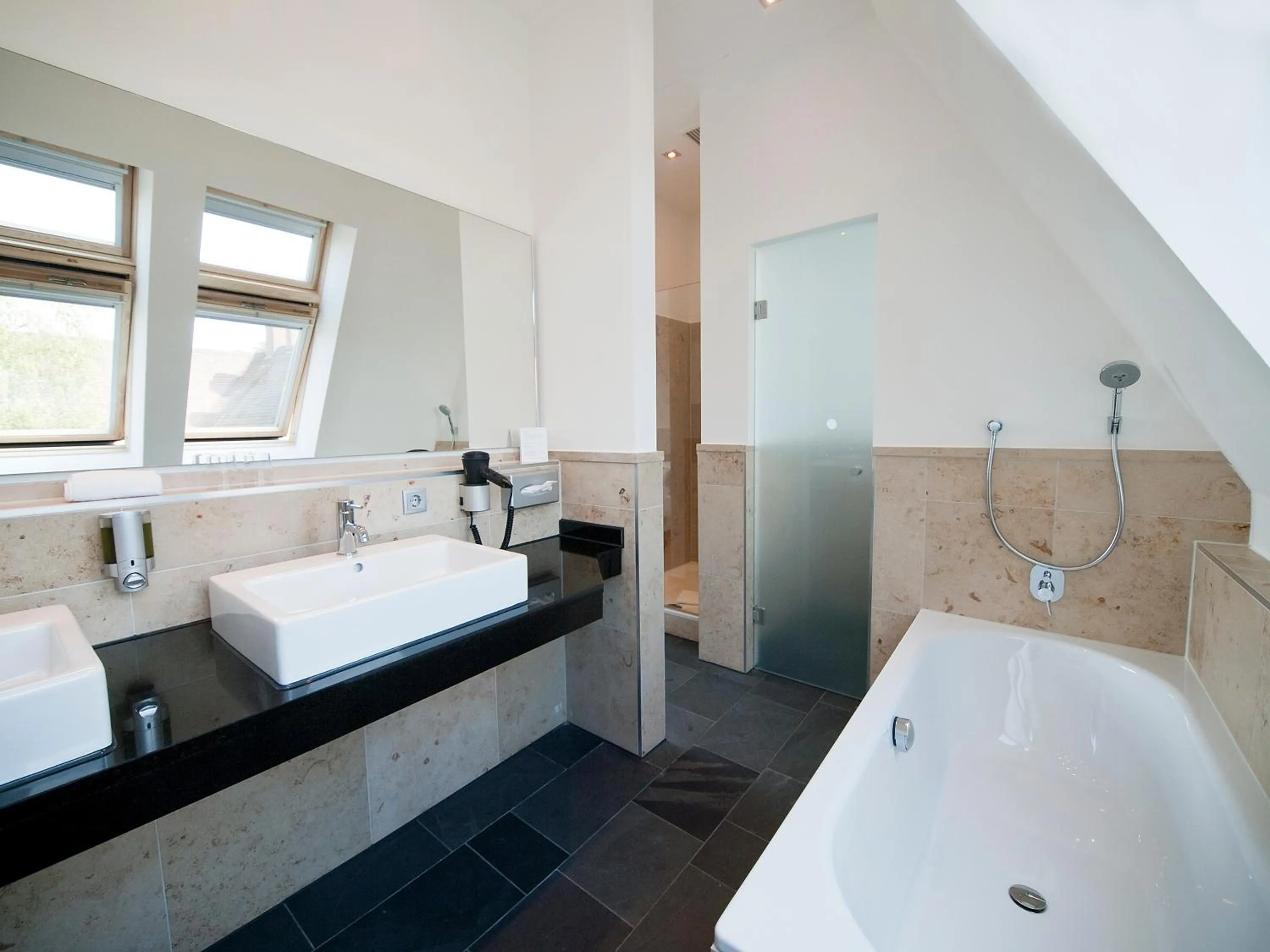 Bathroom, Bed in Qube Hotel Bergheim