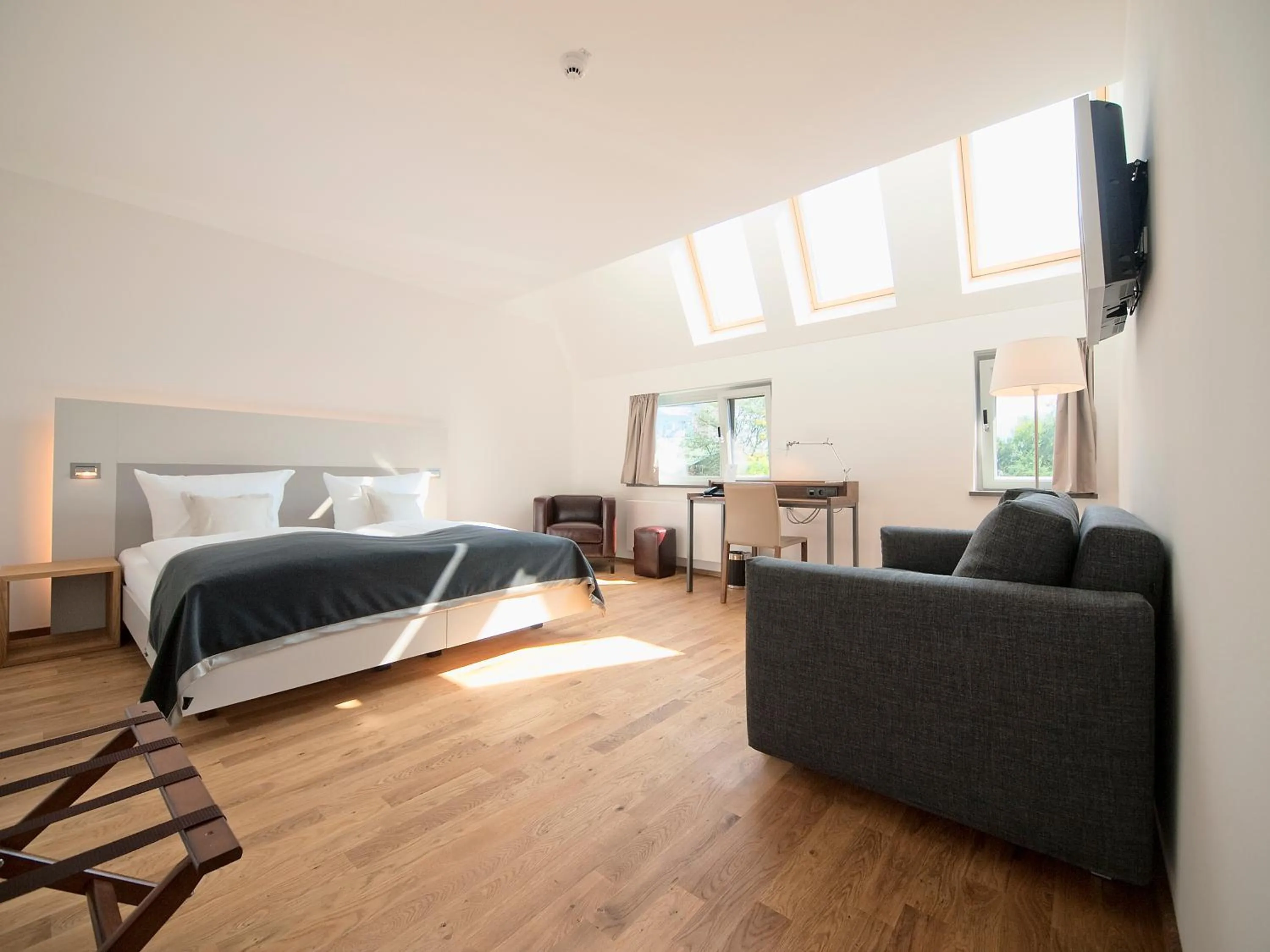 Photo of the whole room, Bed in Qube Hotel Bergheim