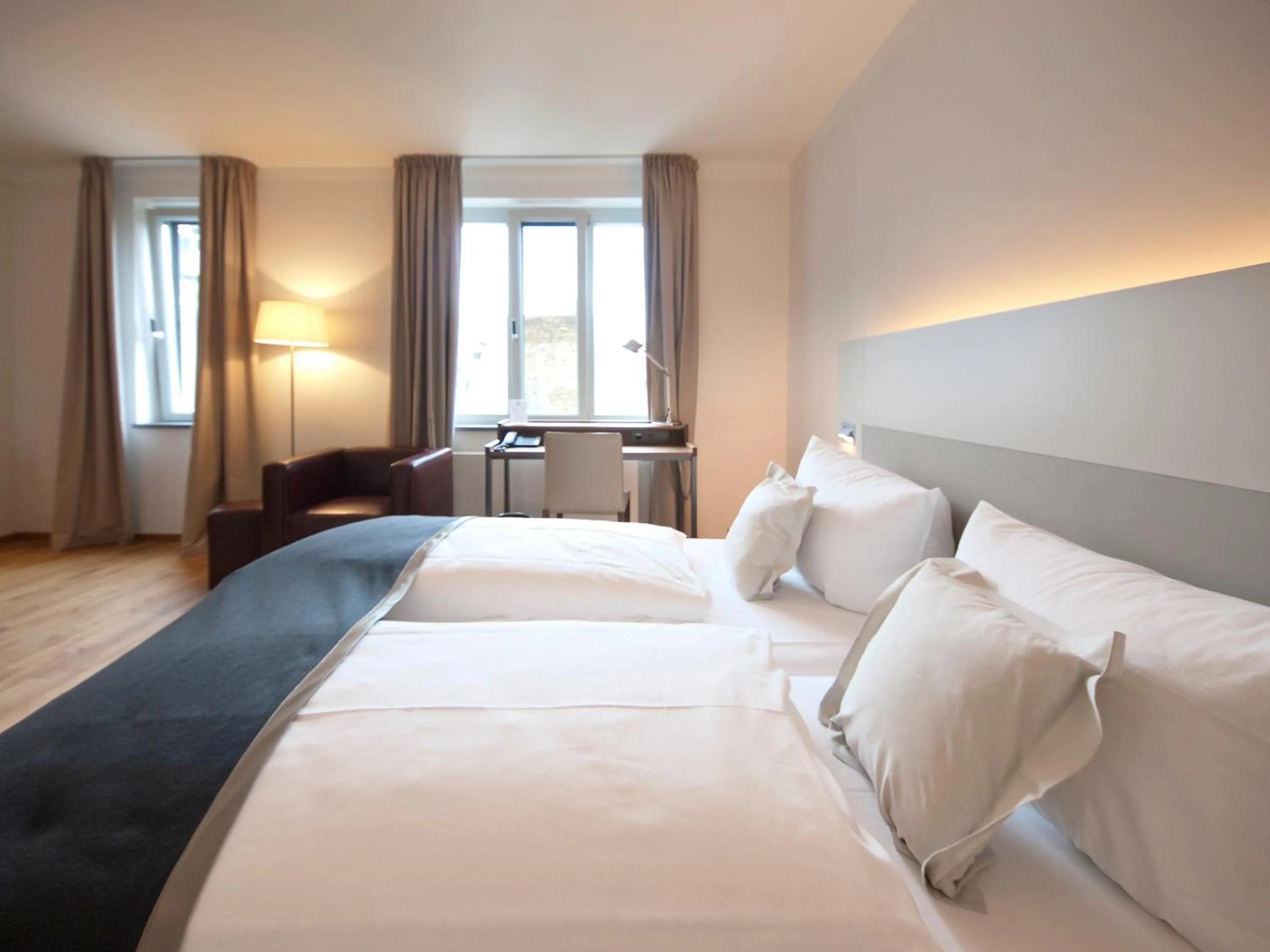 Bed in Qube Hotel Bergheim