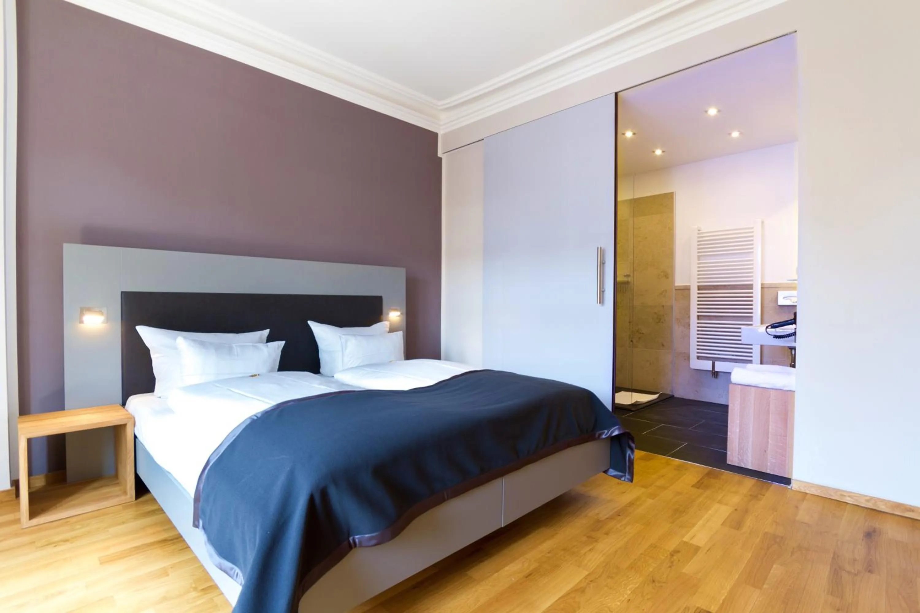 Photo of the whole room, Bed in Qube Hotel Bergheim