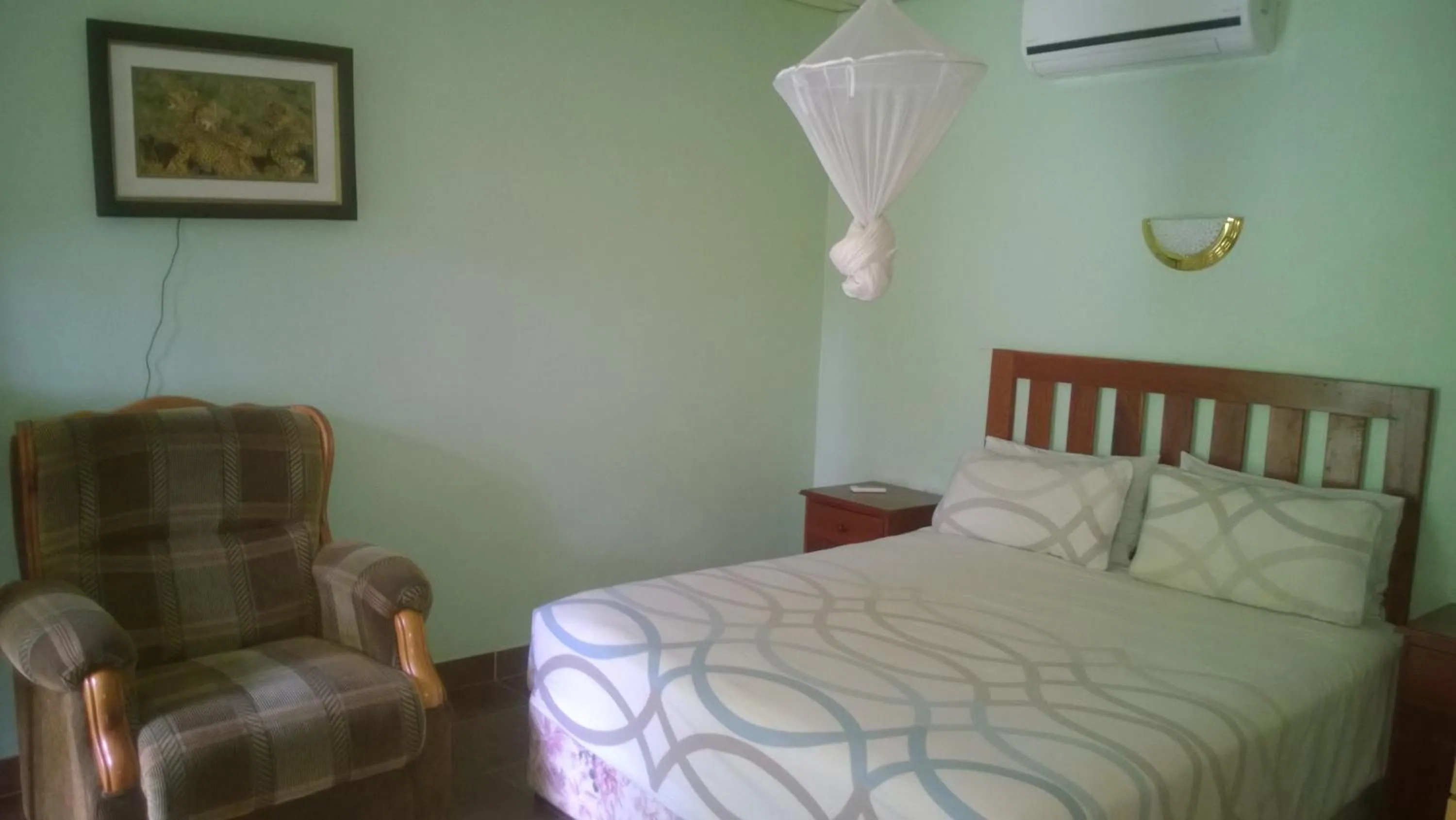 Bed in Gloria's Bed and Breakfast