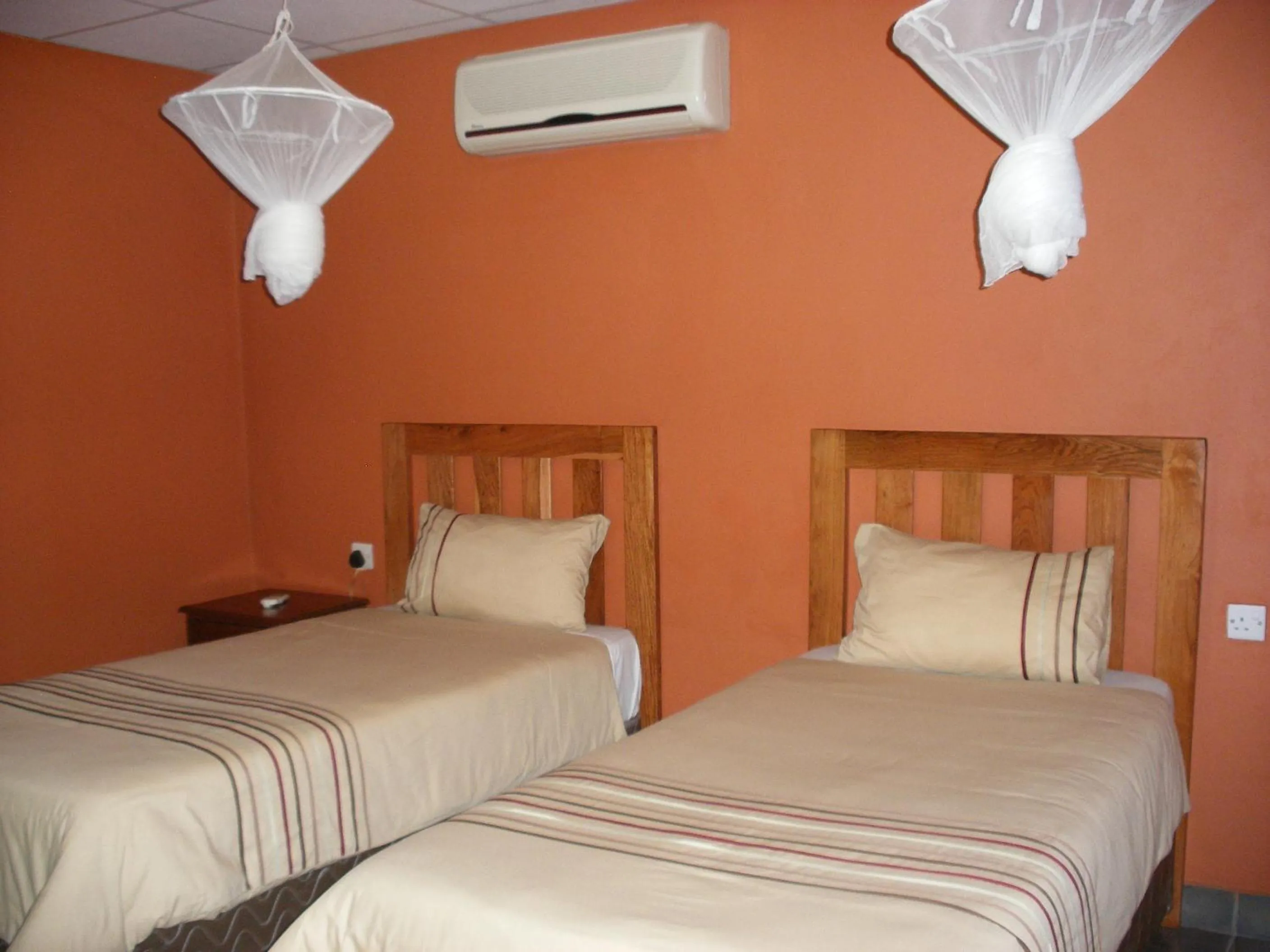 Bed in Gloria's Bed and Breakfast