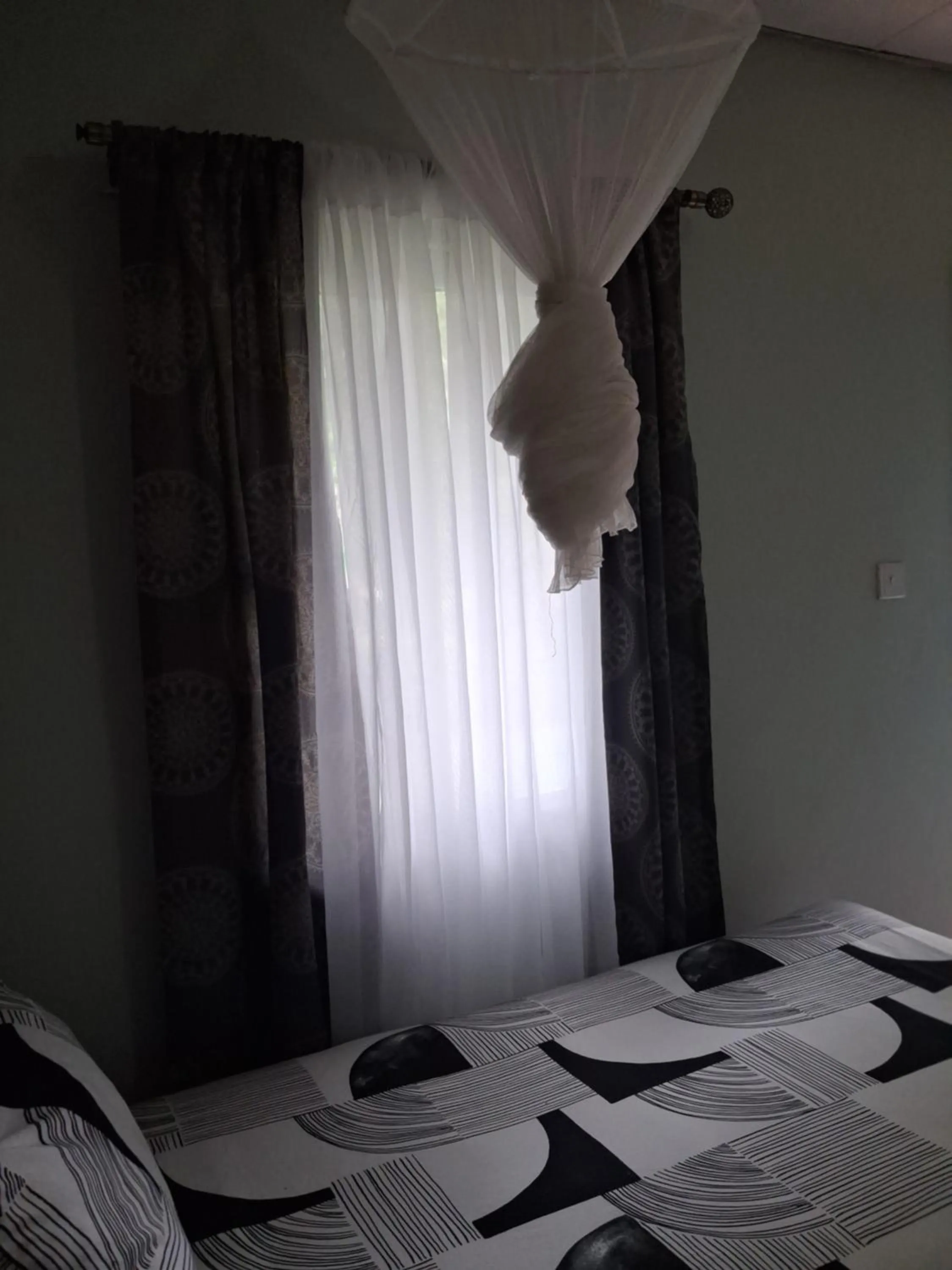 Bed in Gloria's Bed and Breakfast