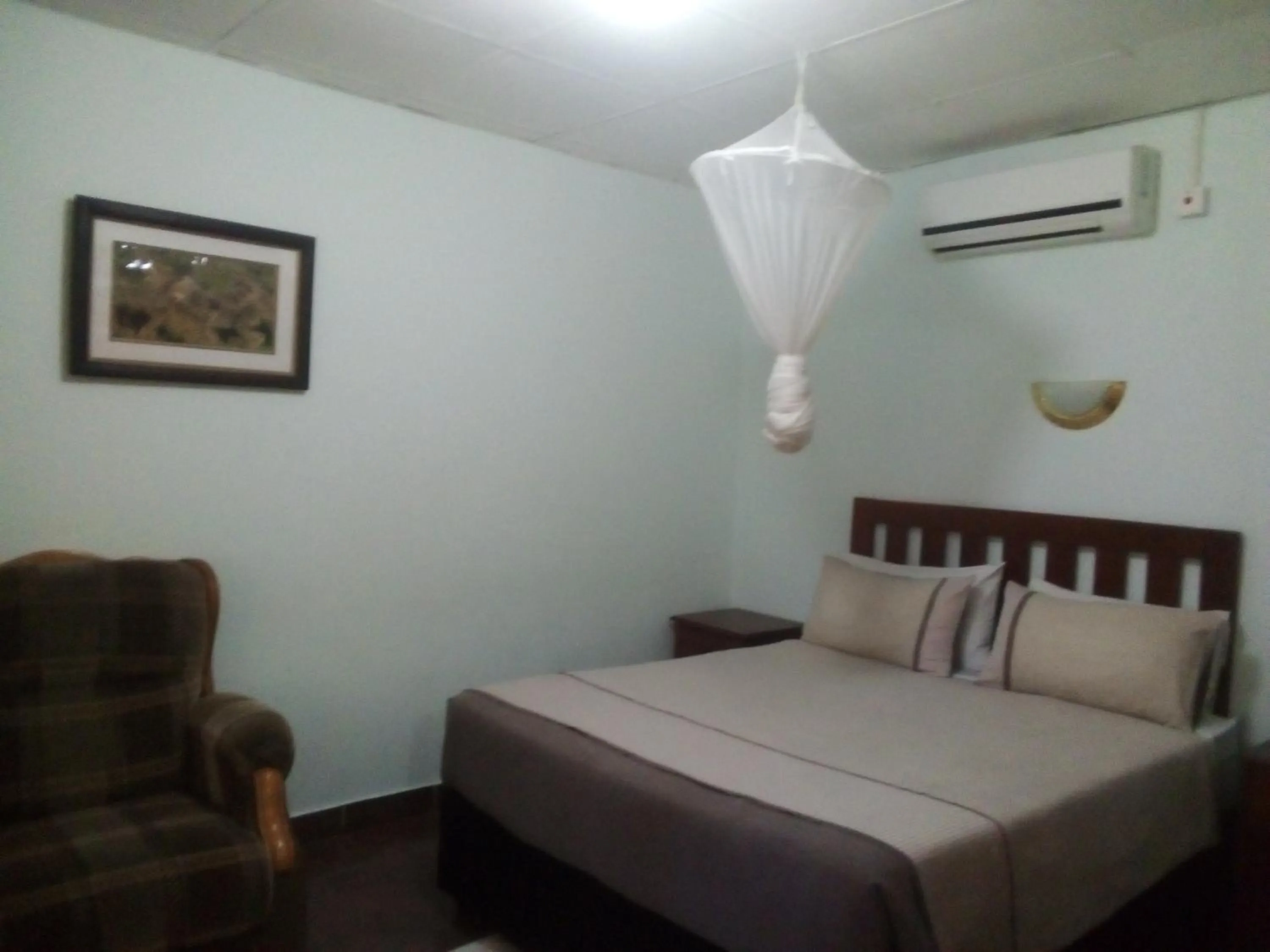 Bed in Gloria's Bed and Breakfast