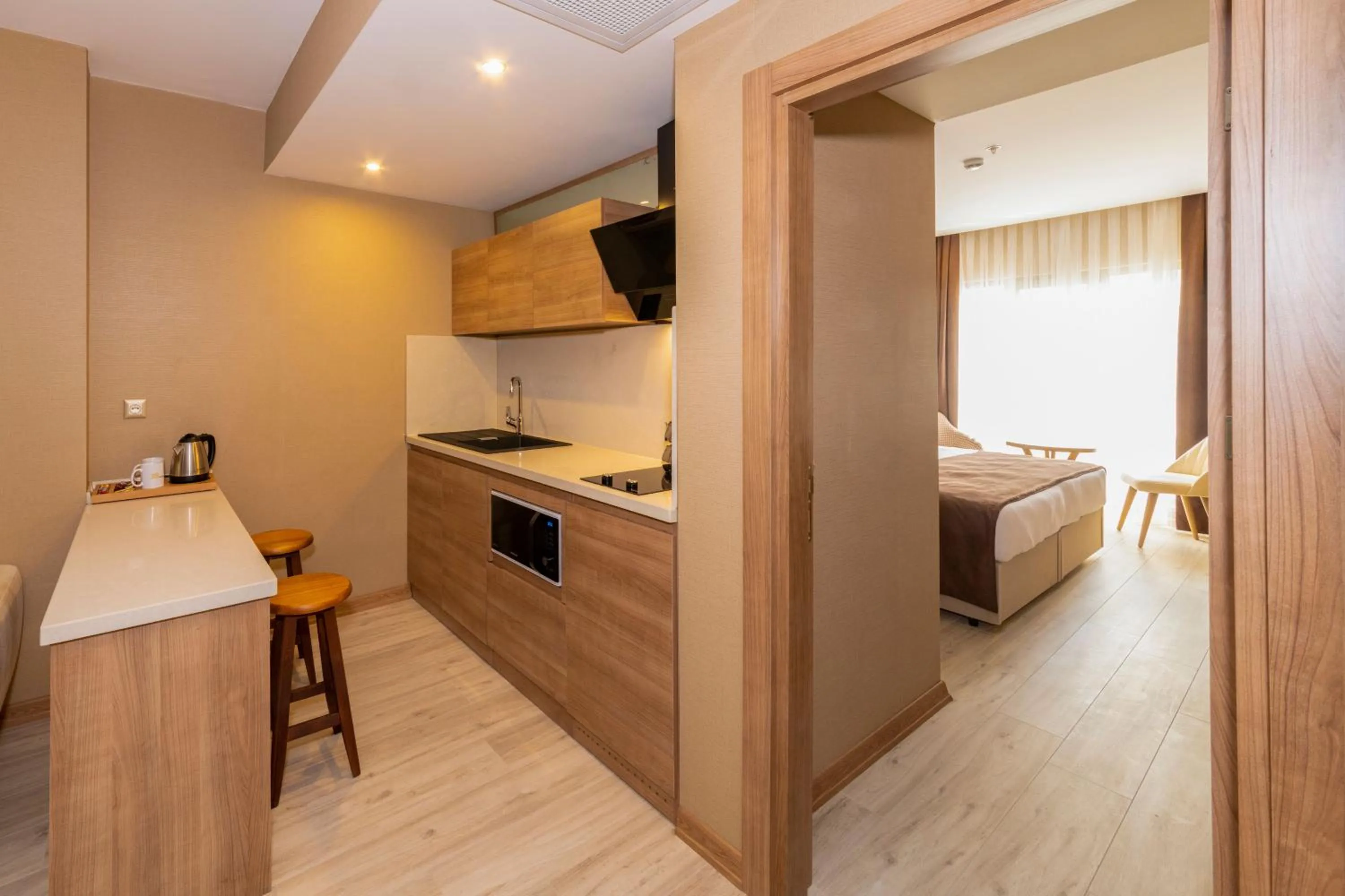 Kitchen or kitchenette, Bed in 38 Hotel