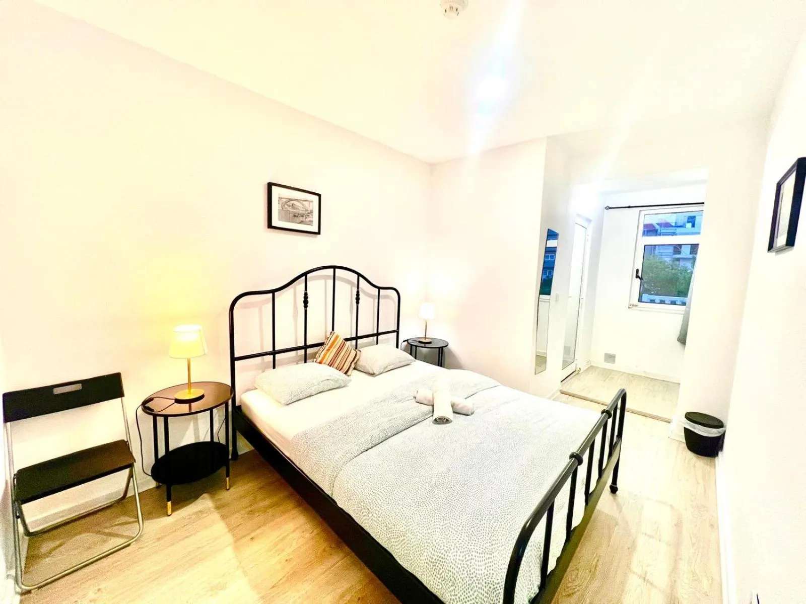 Bed in SwissPorto Guest House