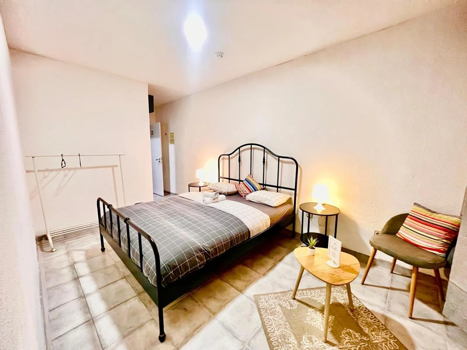 Bed in SwissPorto Guest House