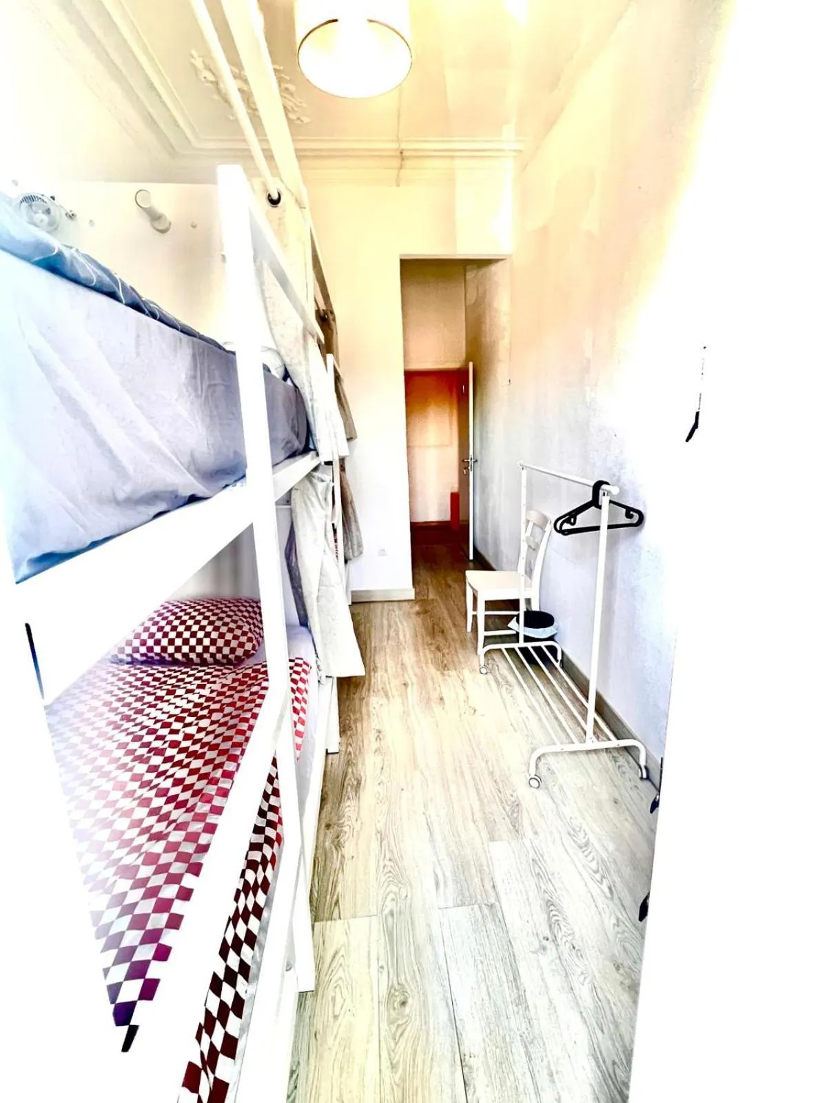 Bed in SwissPorto Guest House