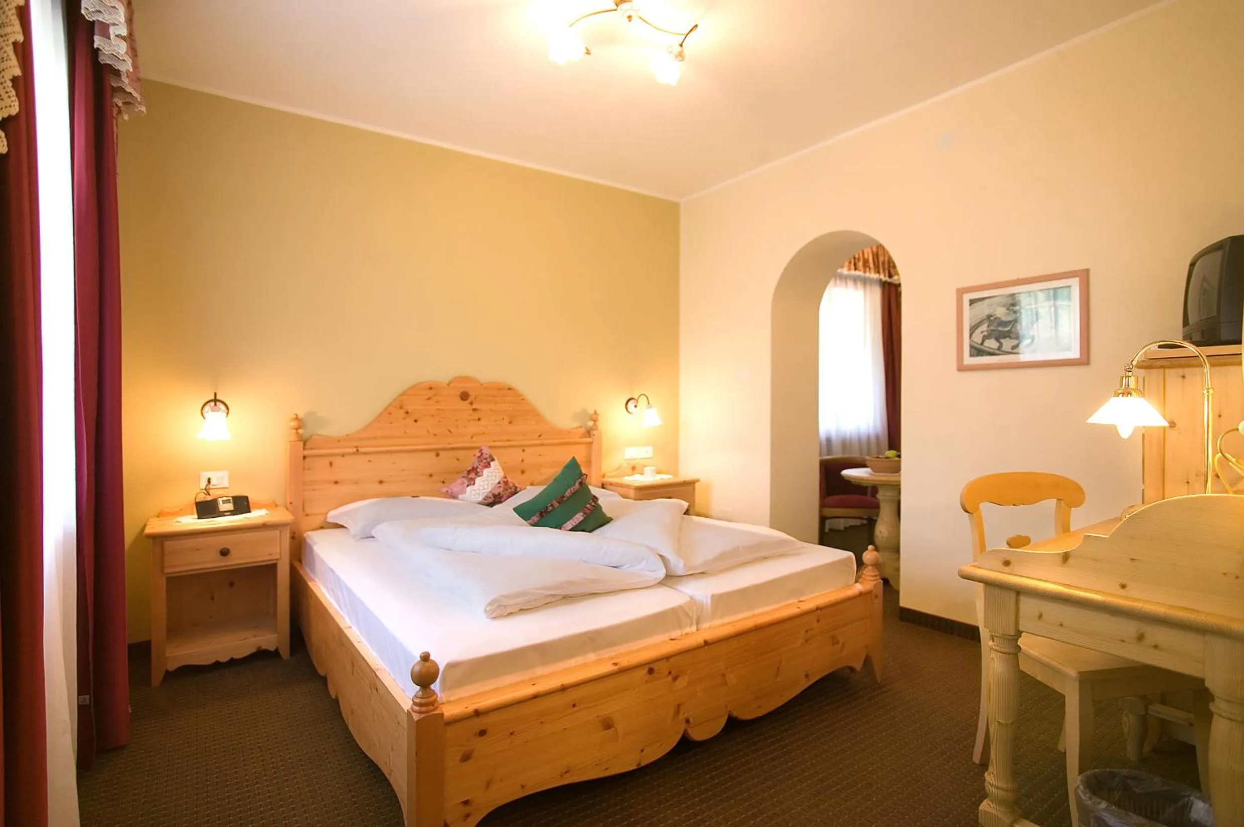 Decorative detail, Bed in PALMENGARTEN Hotel Gstör