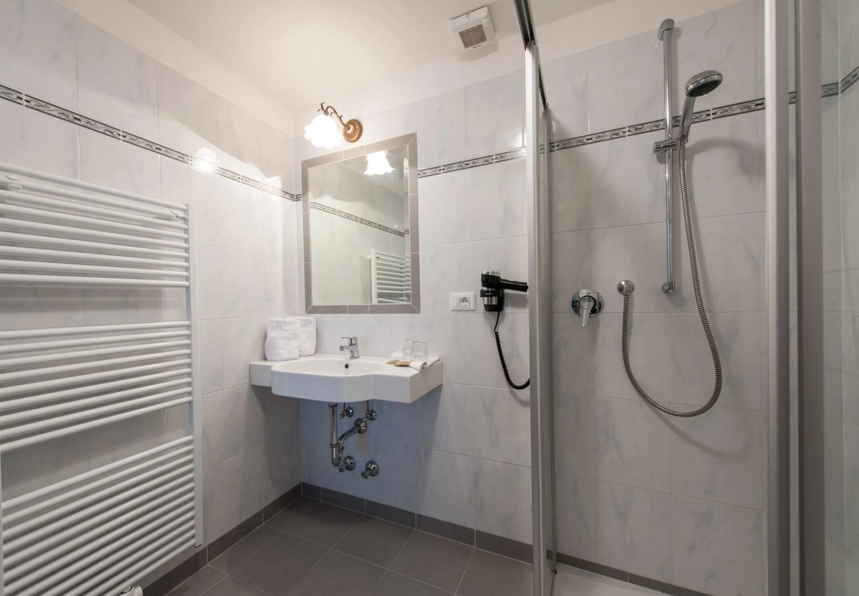 Bathroom in PALMENGARTEN Hotel Gstör