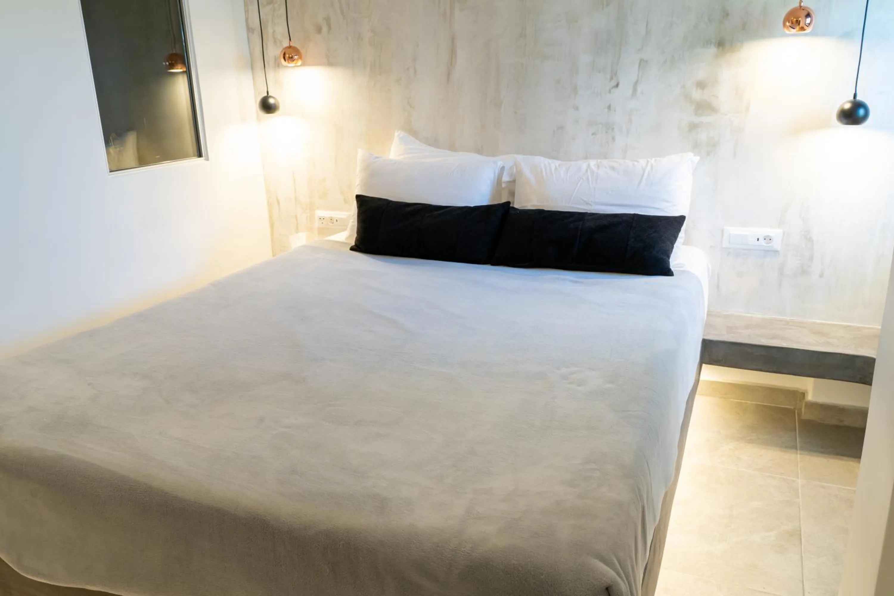 Bed in George & Joanna Suites Santorini