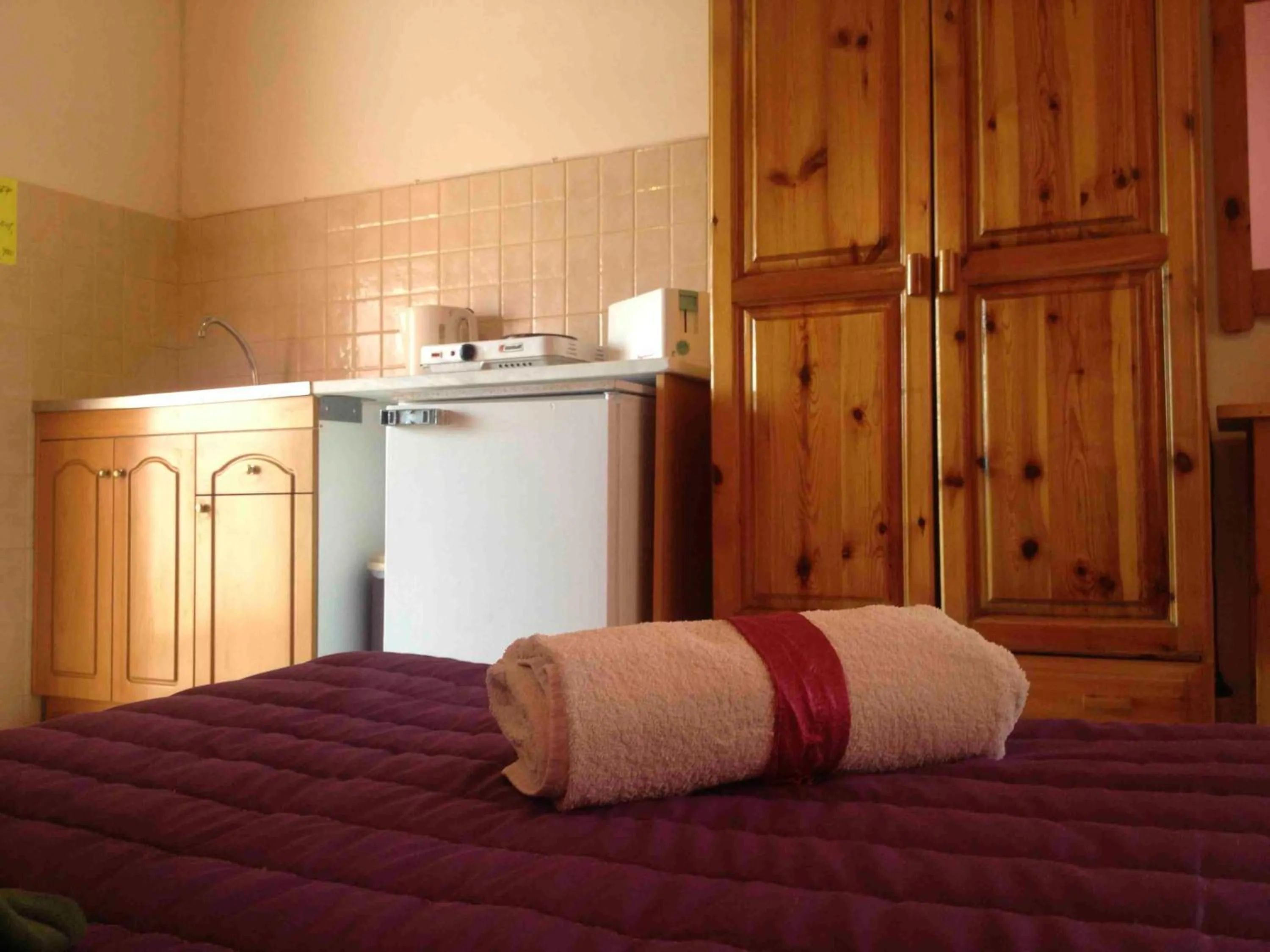 Kitchen or kitchenette, Bed in Ionian Breeze Apartments
