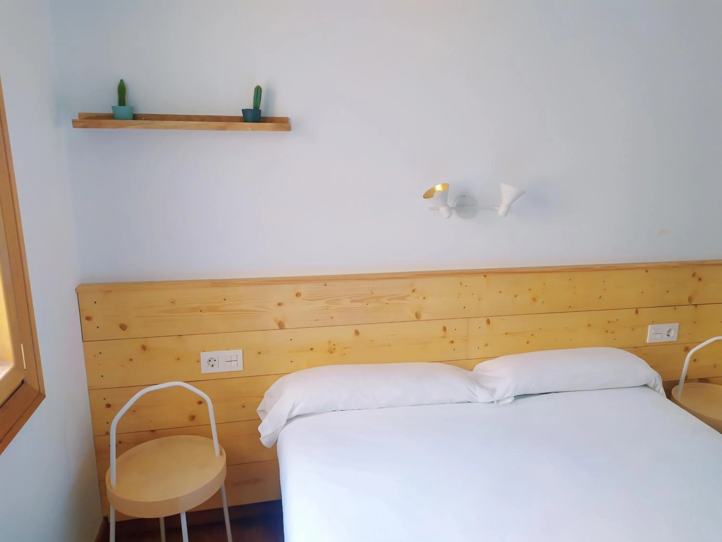 Bed in Pensión Urkia