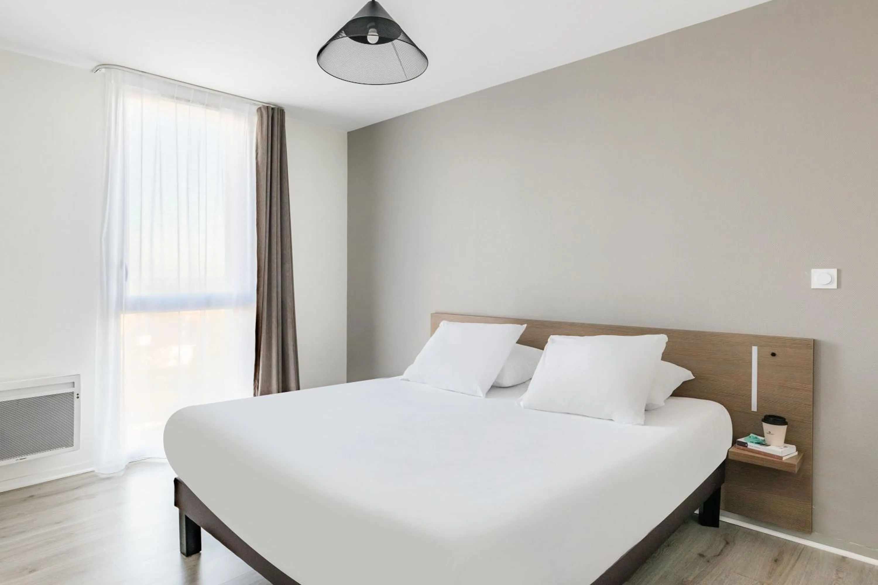 Bed in Appart'City Confort Saint-Nazaire Océan