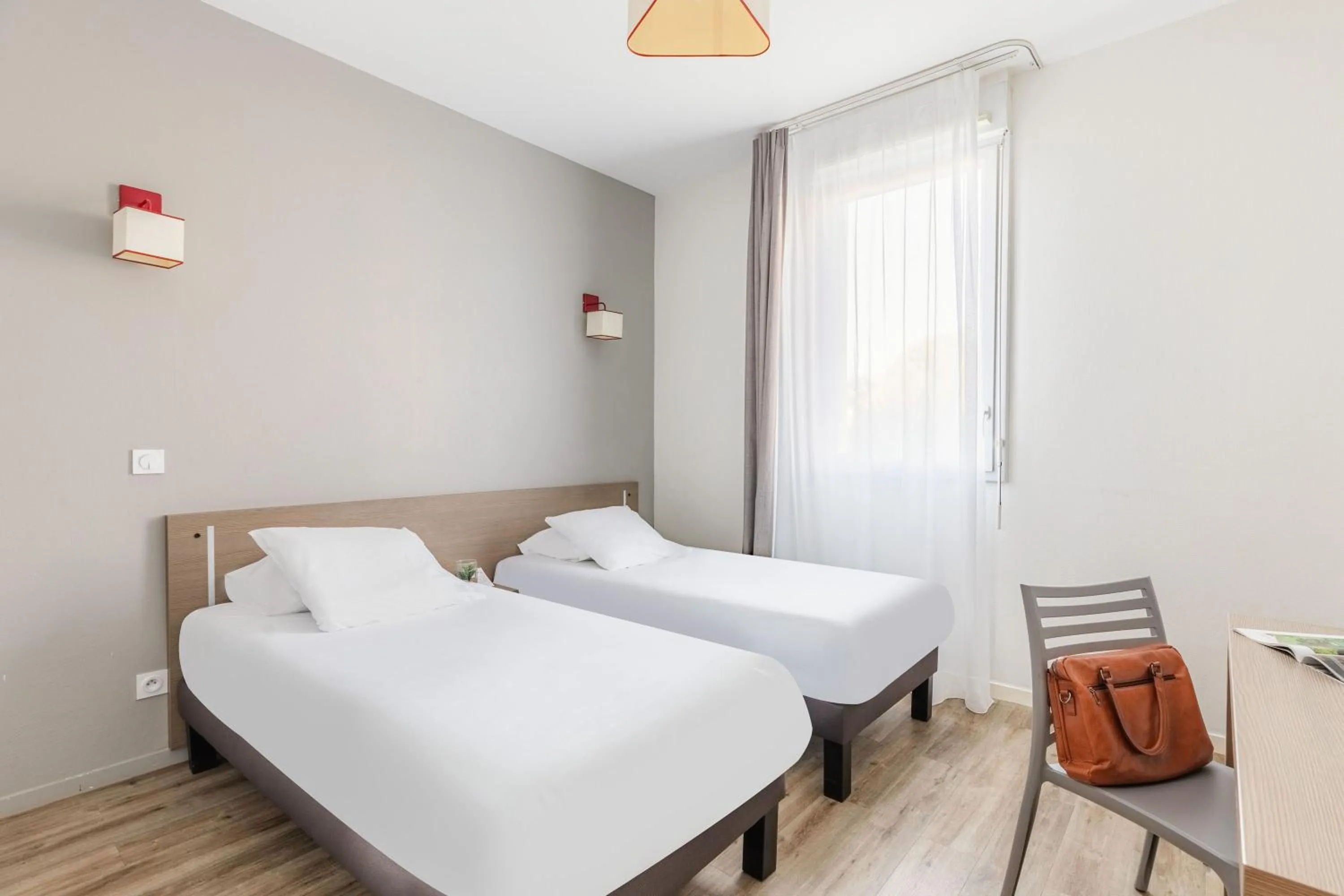 Bed in Appart'City Confort Saint-Nazaire Océan