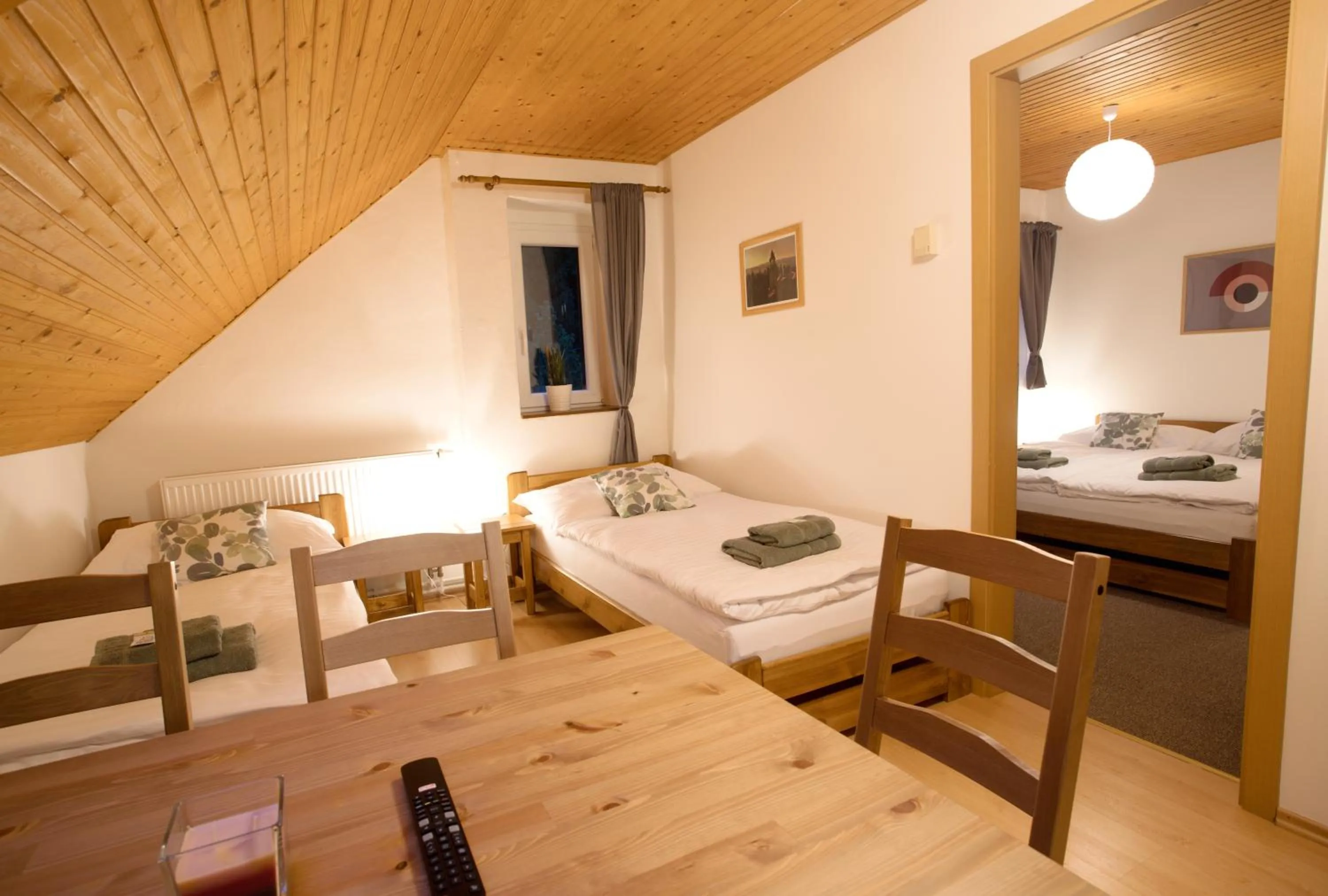 Living room, Bed in Apartmány Bramborka