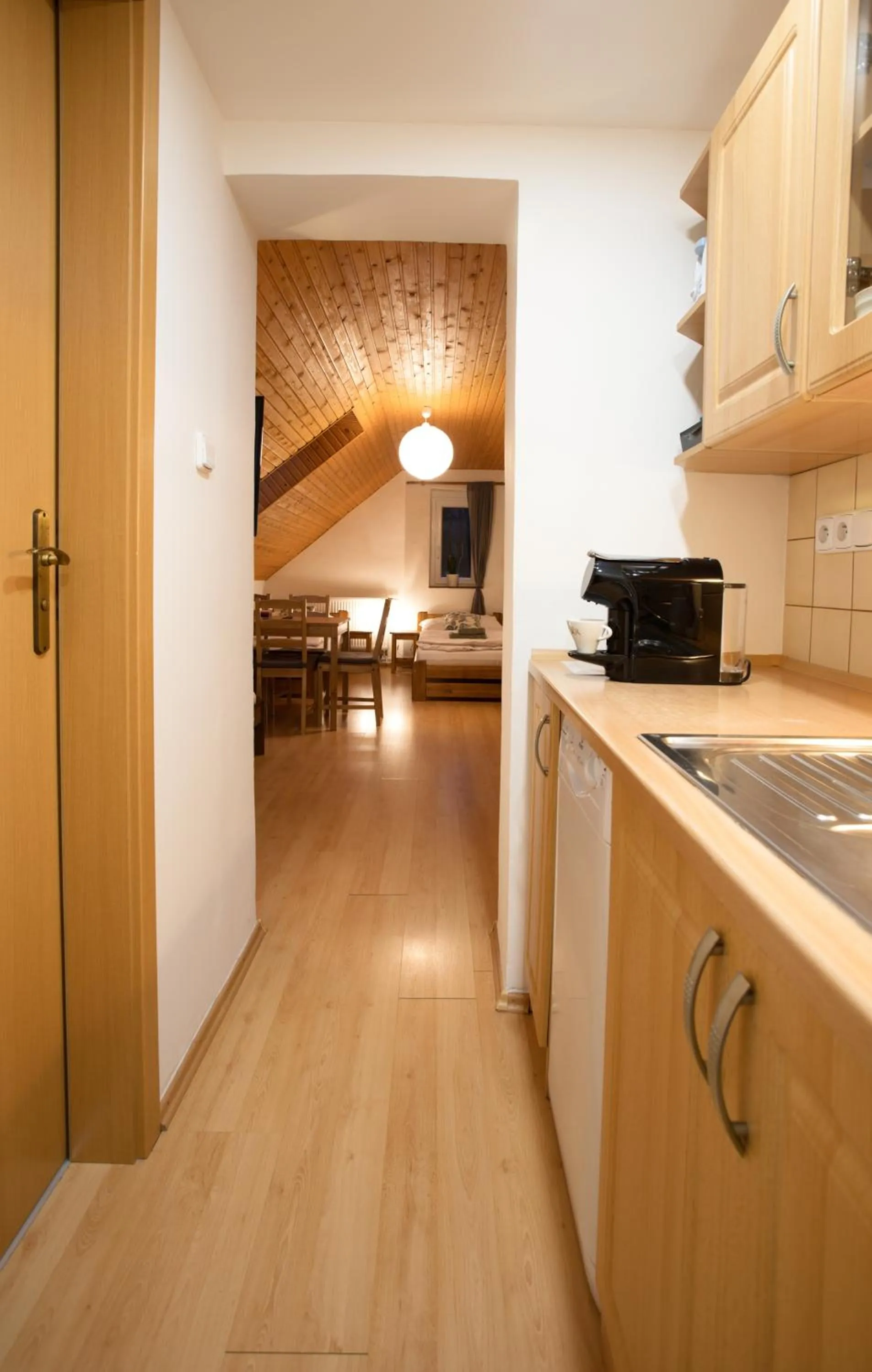 Kitchen or kitchenette in Apartmány Bramborka