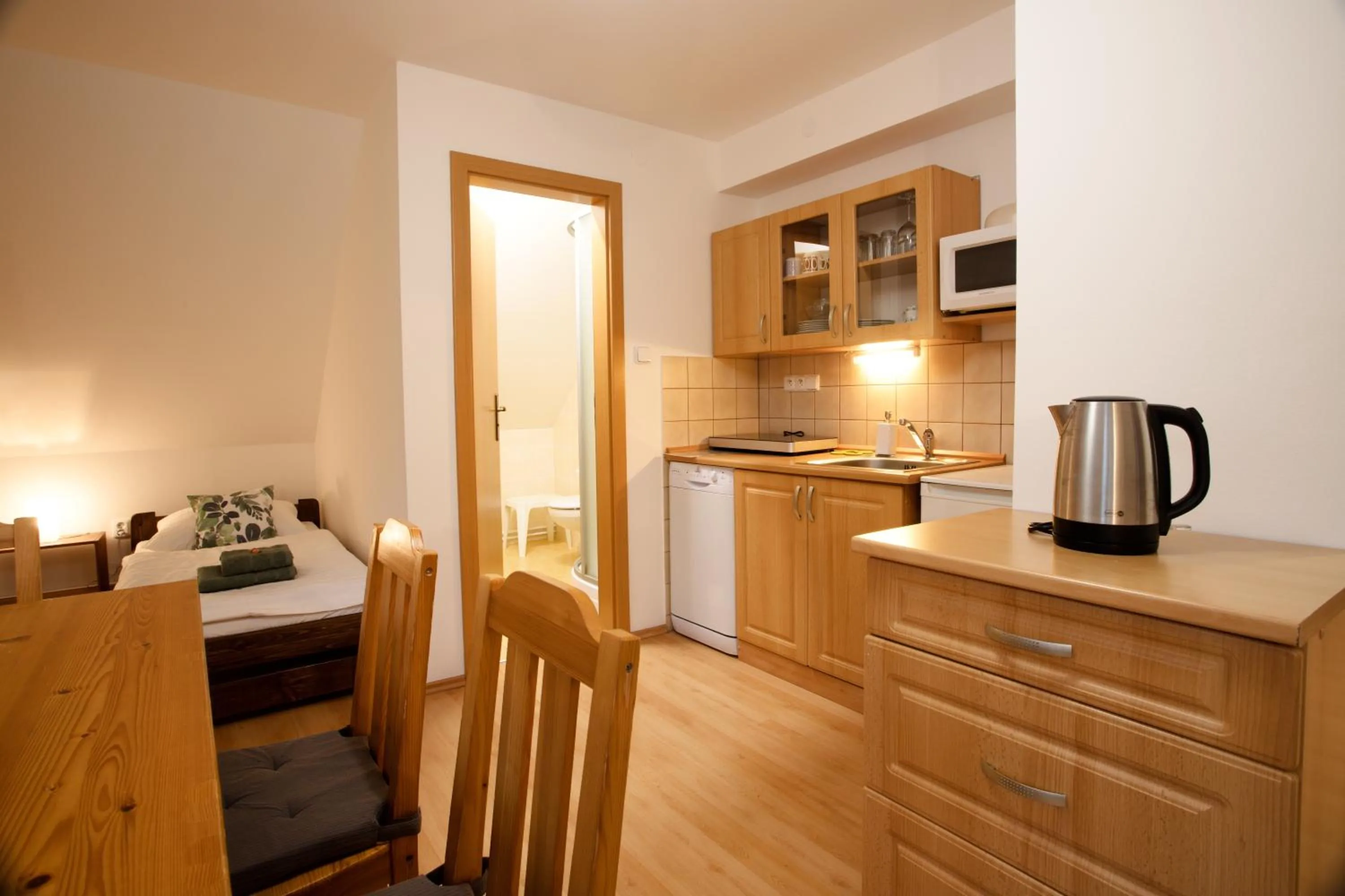 Kitchen or kitchenette in Apartmány Bramborka