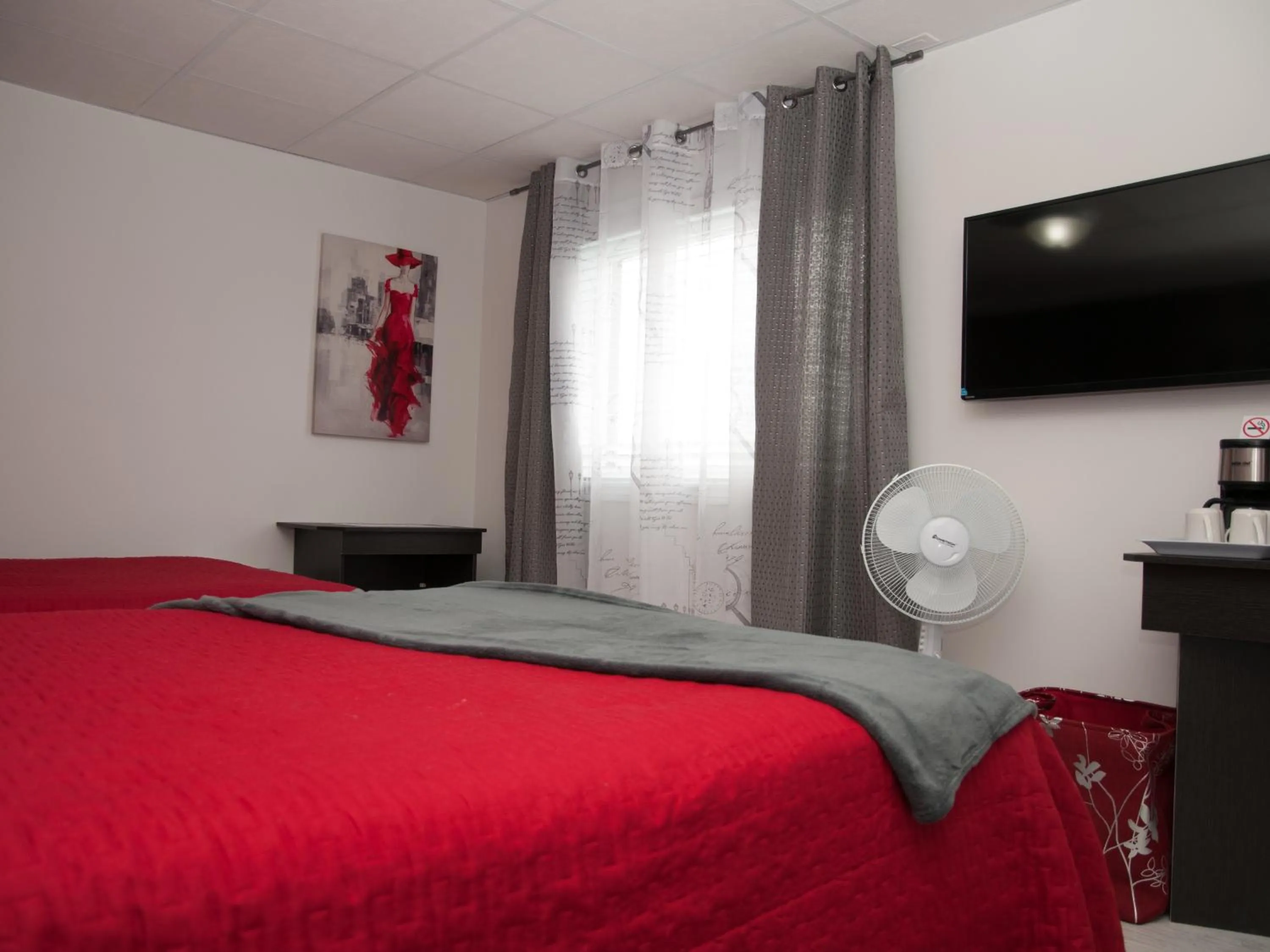 Bed in Hotel Le Plaza