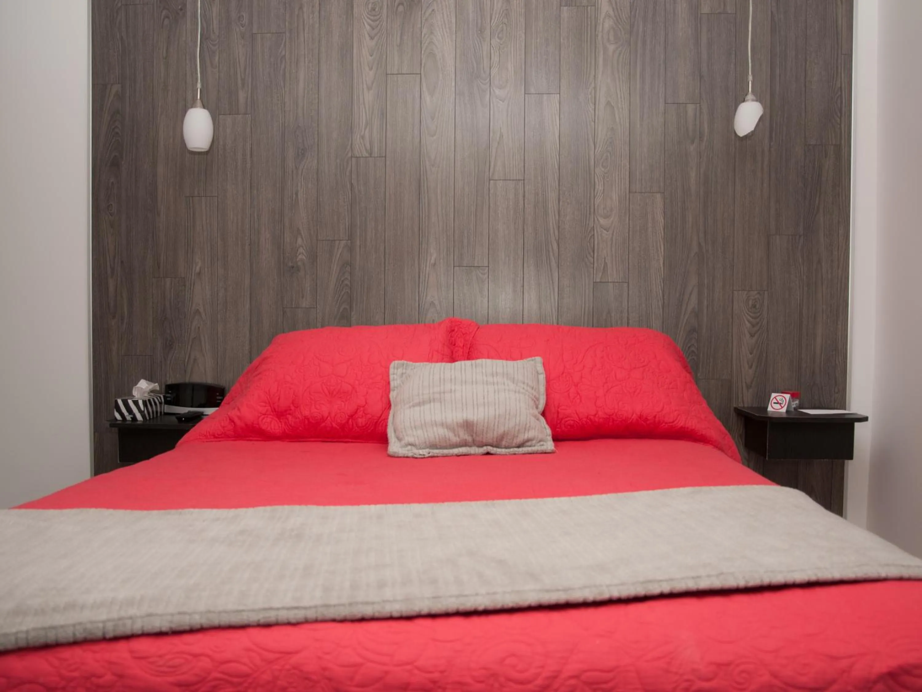 Bed in Hotel Le Plaza