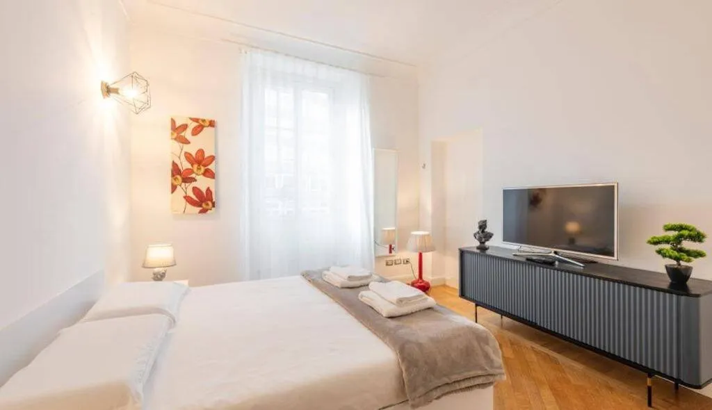 Bedroom, Bed in Milan Royal Suites - Centro