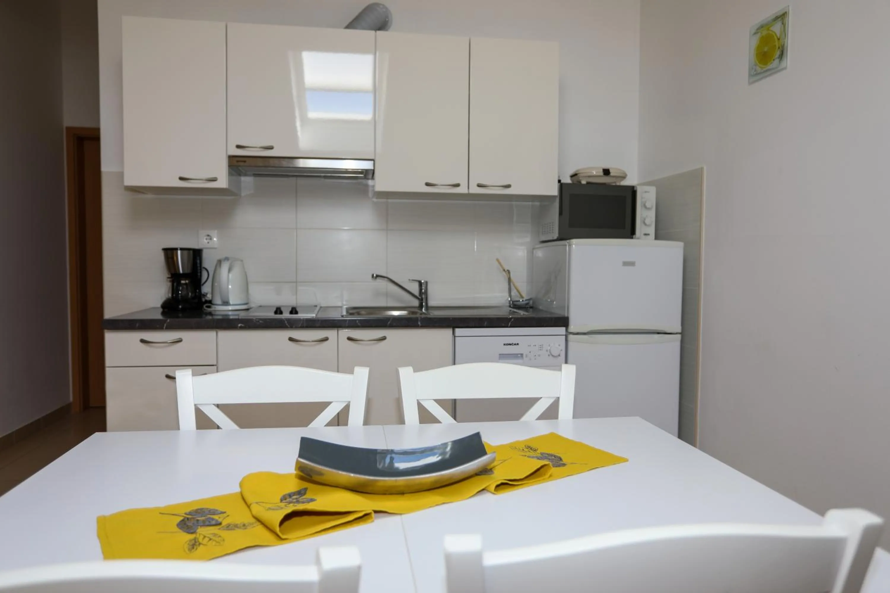 kitchen in Apartments Plazibat
