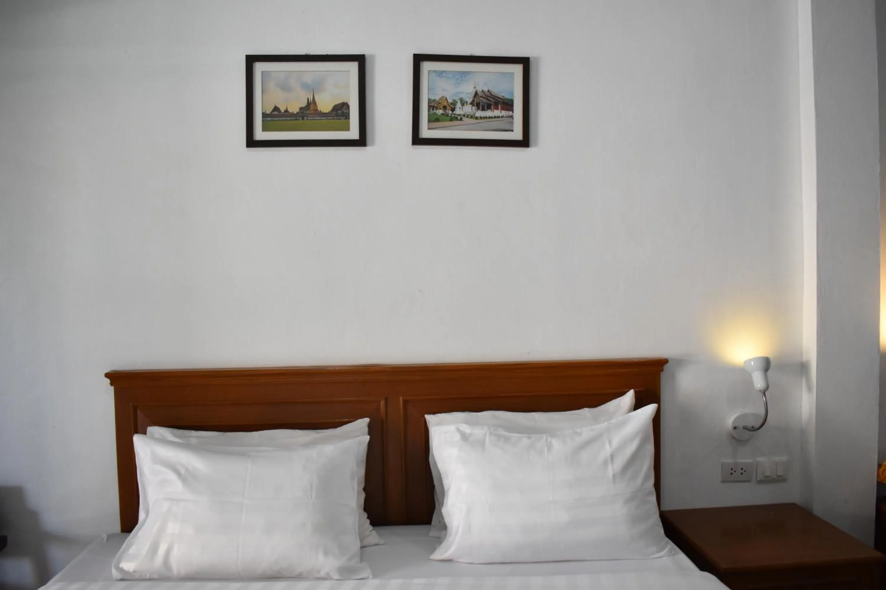 Bed in Sala Bua Room