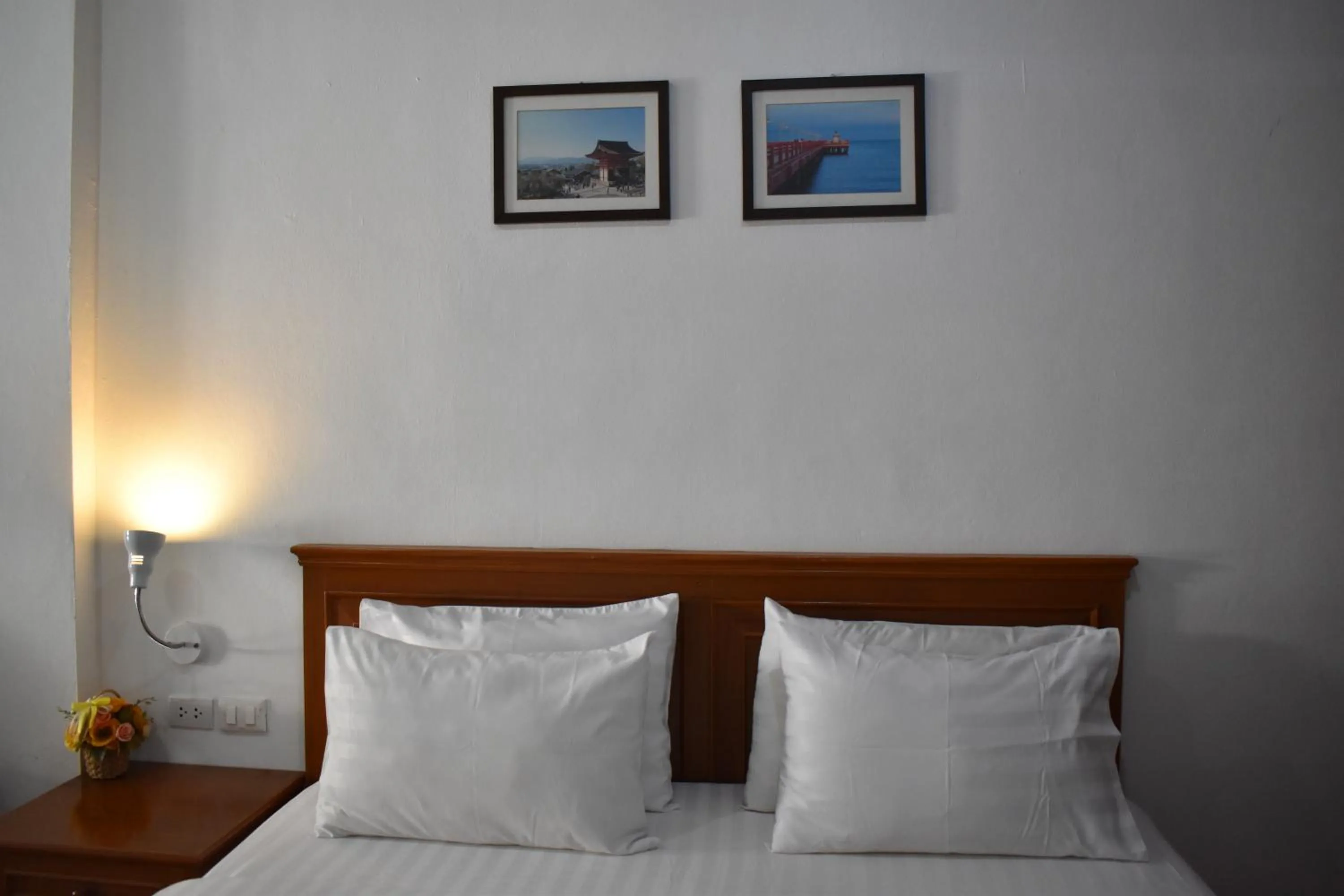 Bed in Sala Bua Room