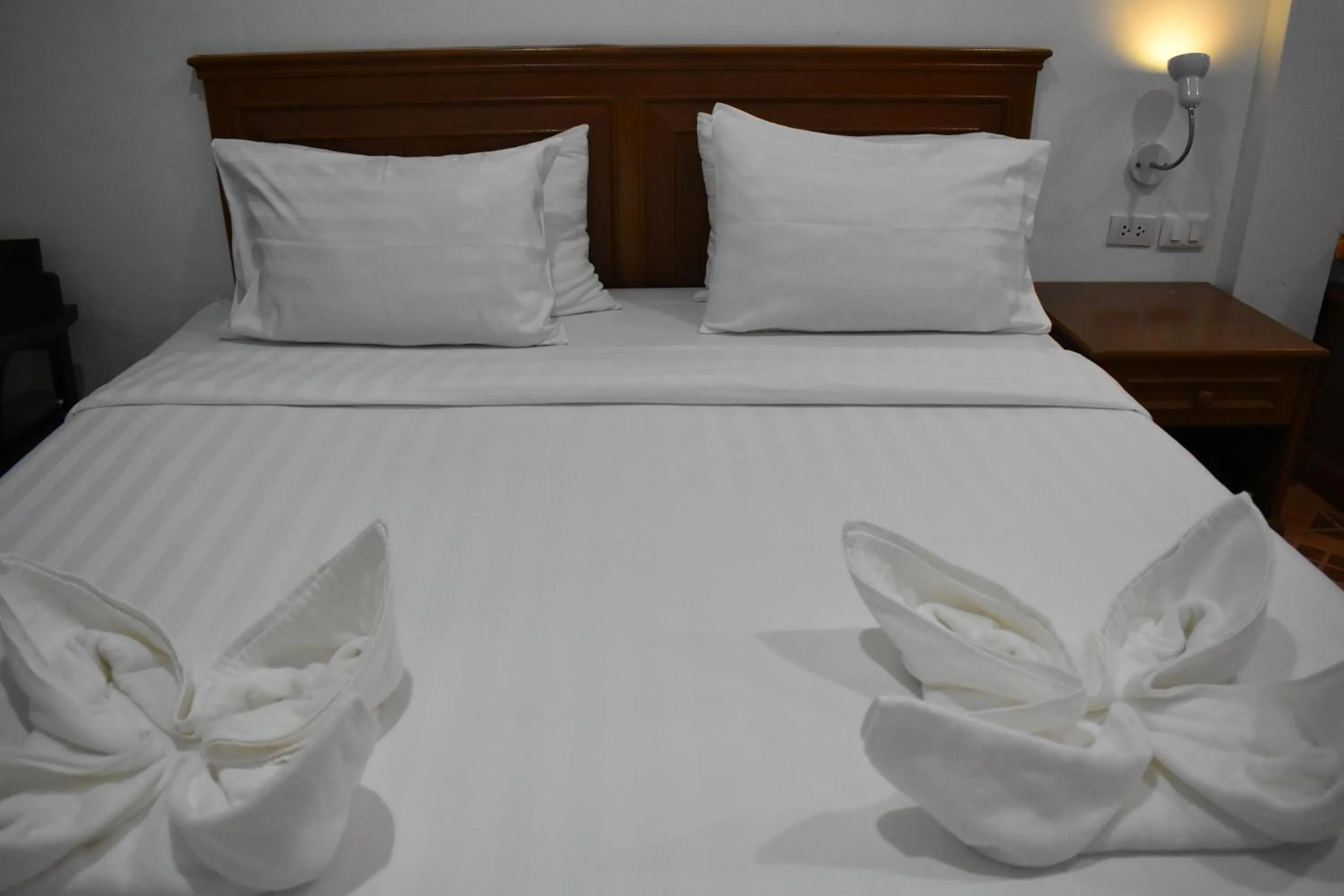 Bed in Sala Bua Room