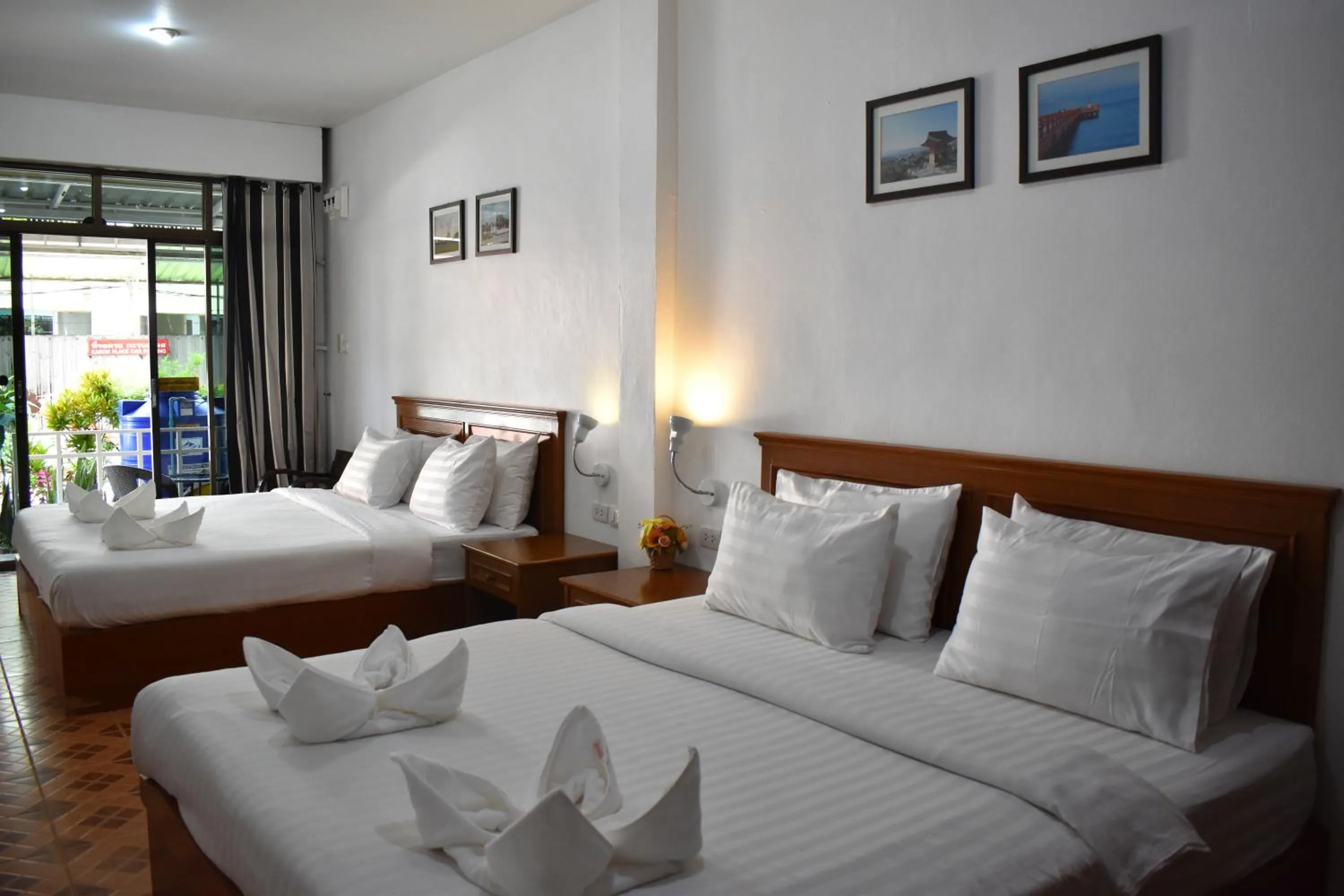 Photo of the whole room, Bed in Sala Bua Room