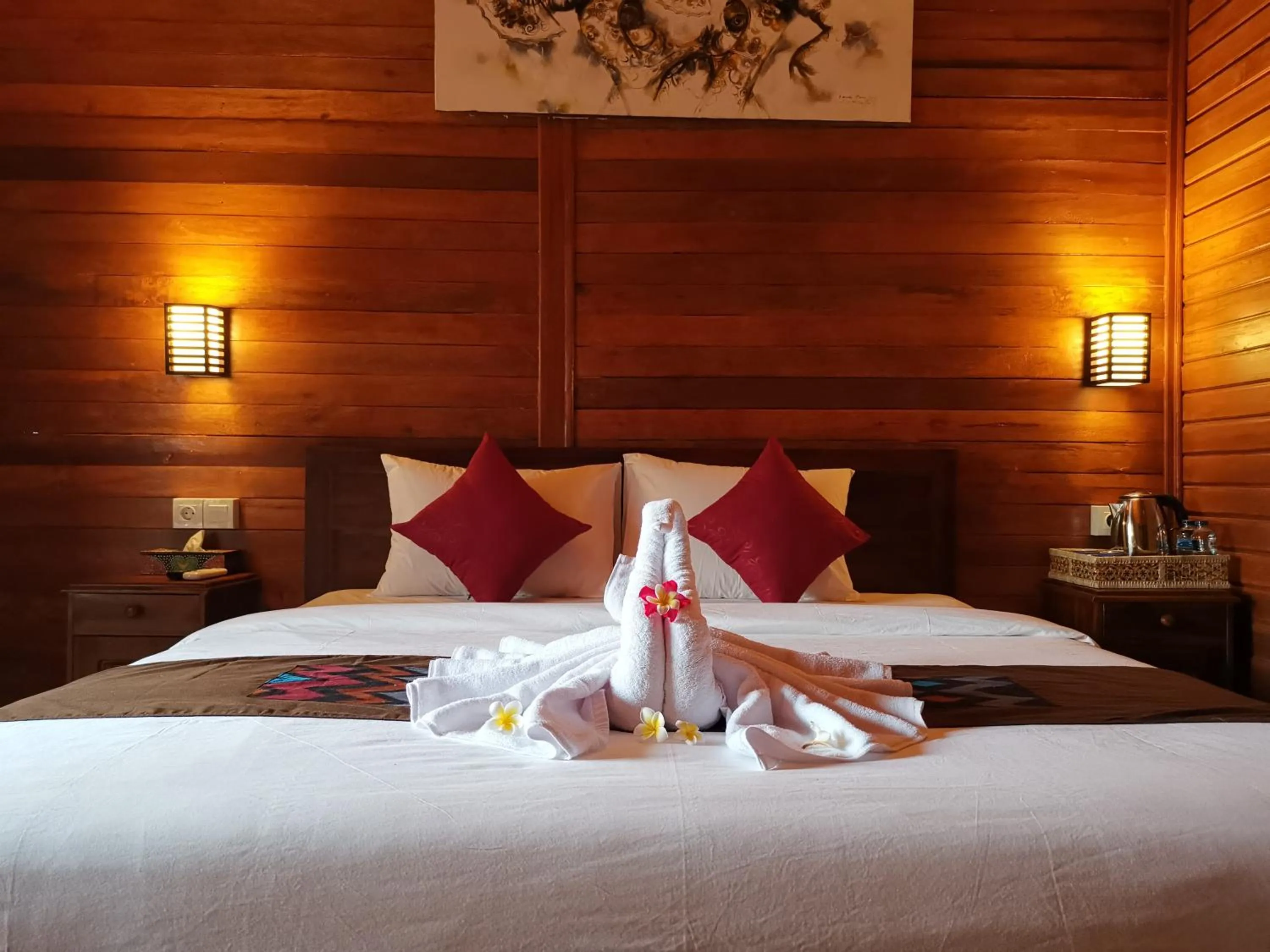 Bed in Kamasan Cottage By Reccoma